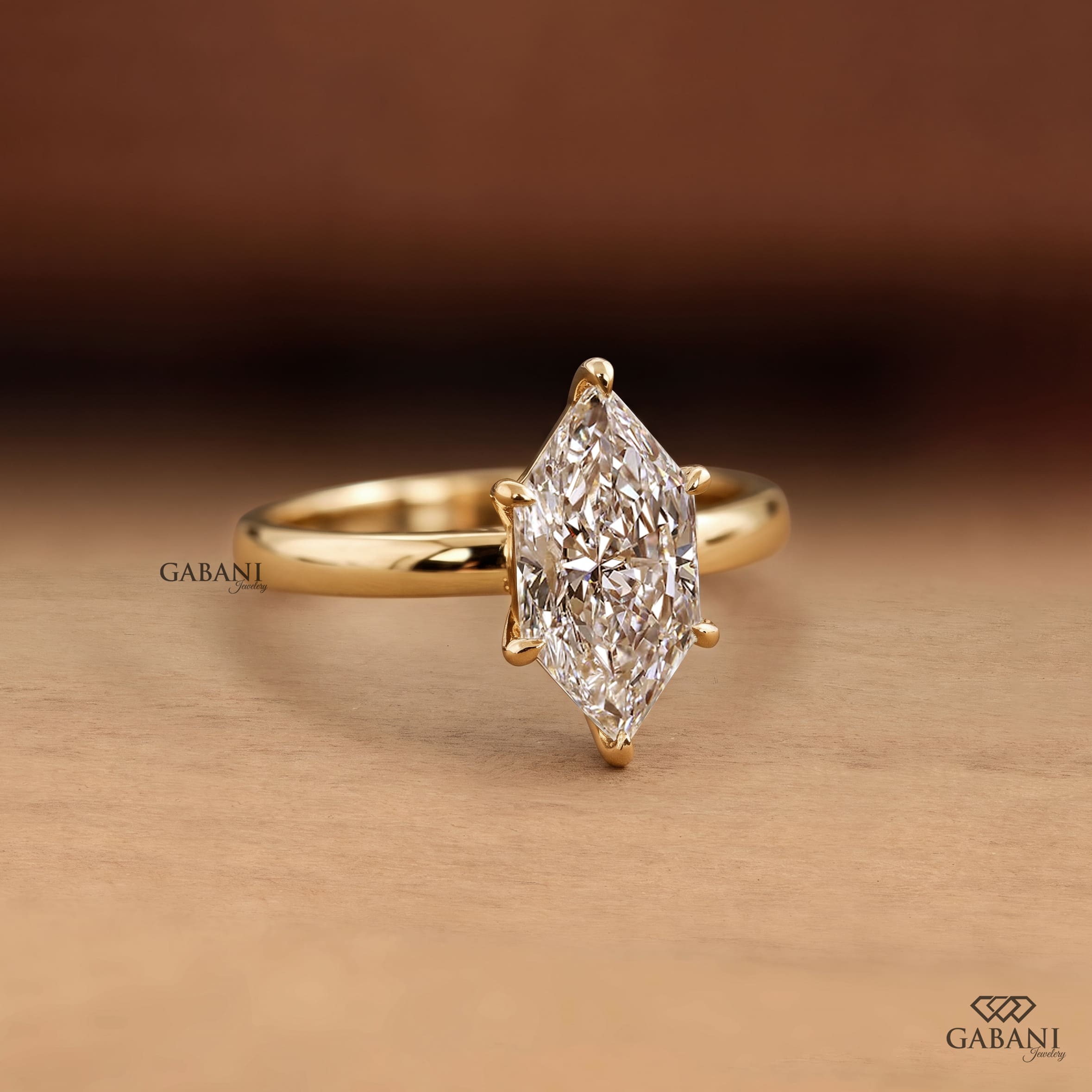 Marquise cut lab grown diamond engagement ring with six prong solitaire setting and classic 18K gold band
