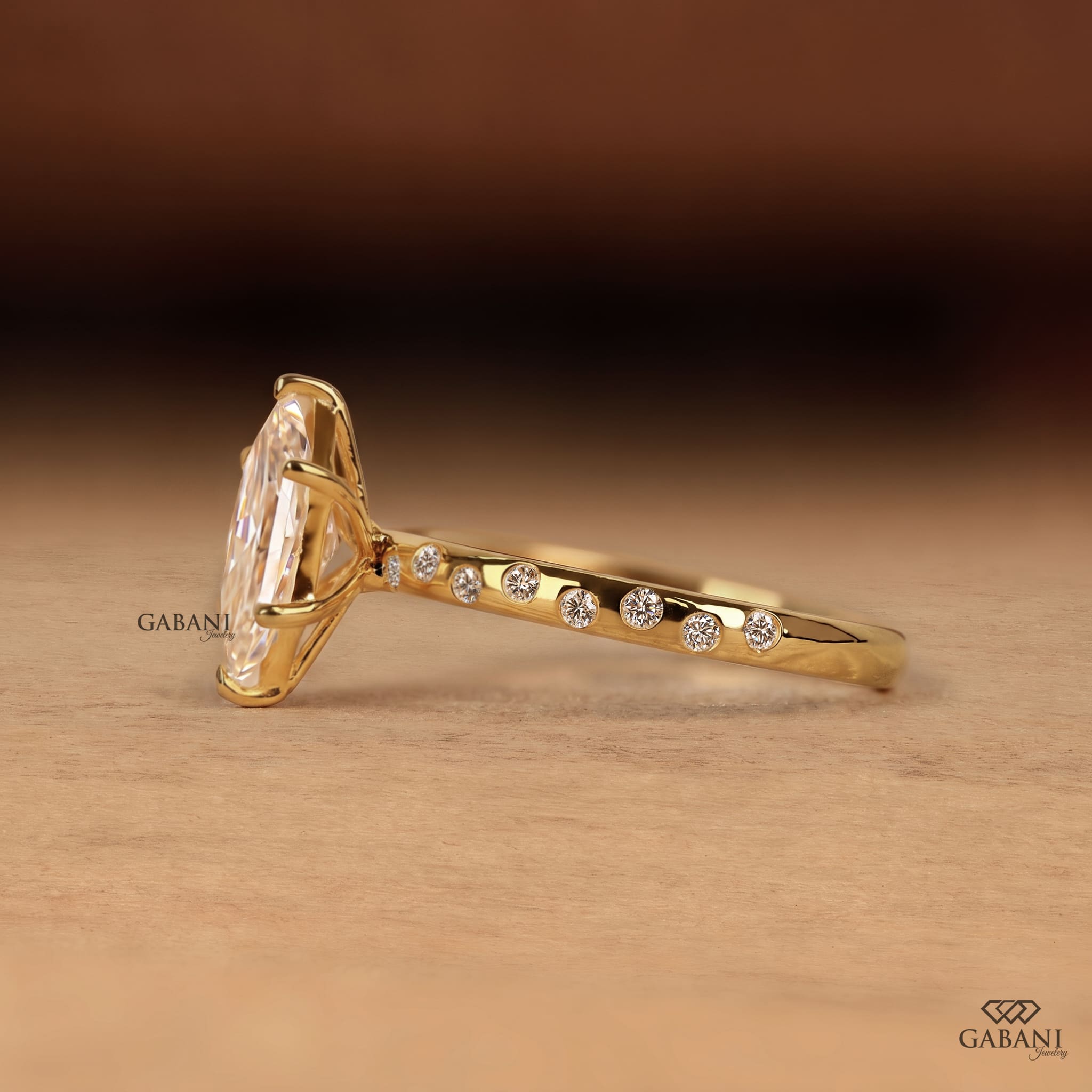 Marquise cut lab grown diamond engagement ring with sparkling round diamond accent band and elegant prong setting