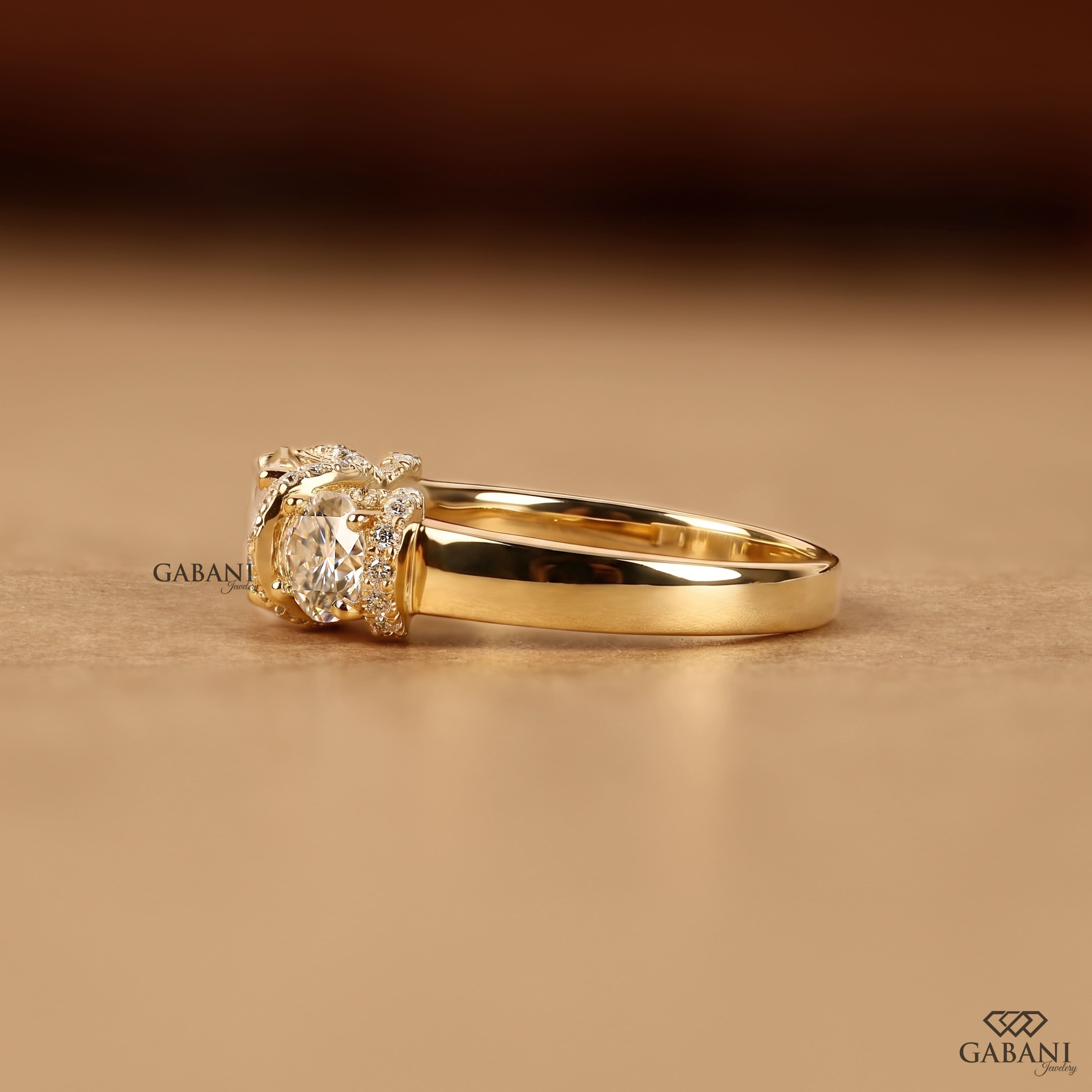 1.5 to 2 carat lab grown diamond engagement ring with cushion and pear cuts