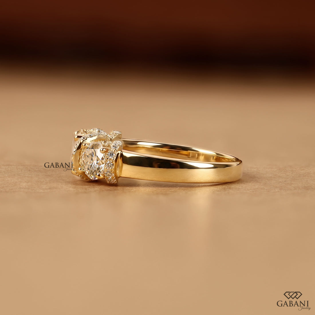 1.5 to 2 carat lab grown diamond engagement ring with cushion and pear cuts
