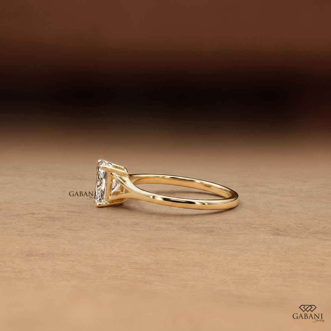 Cushion cut lab grown diamond engagement ring with modern split shank band design