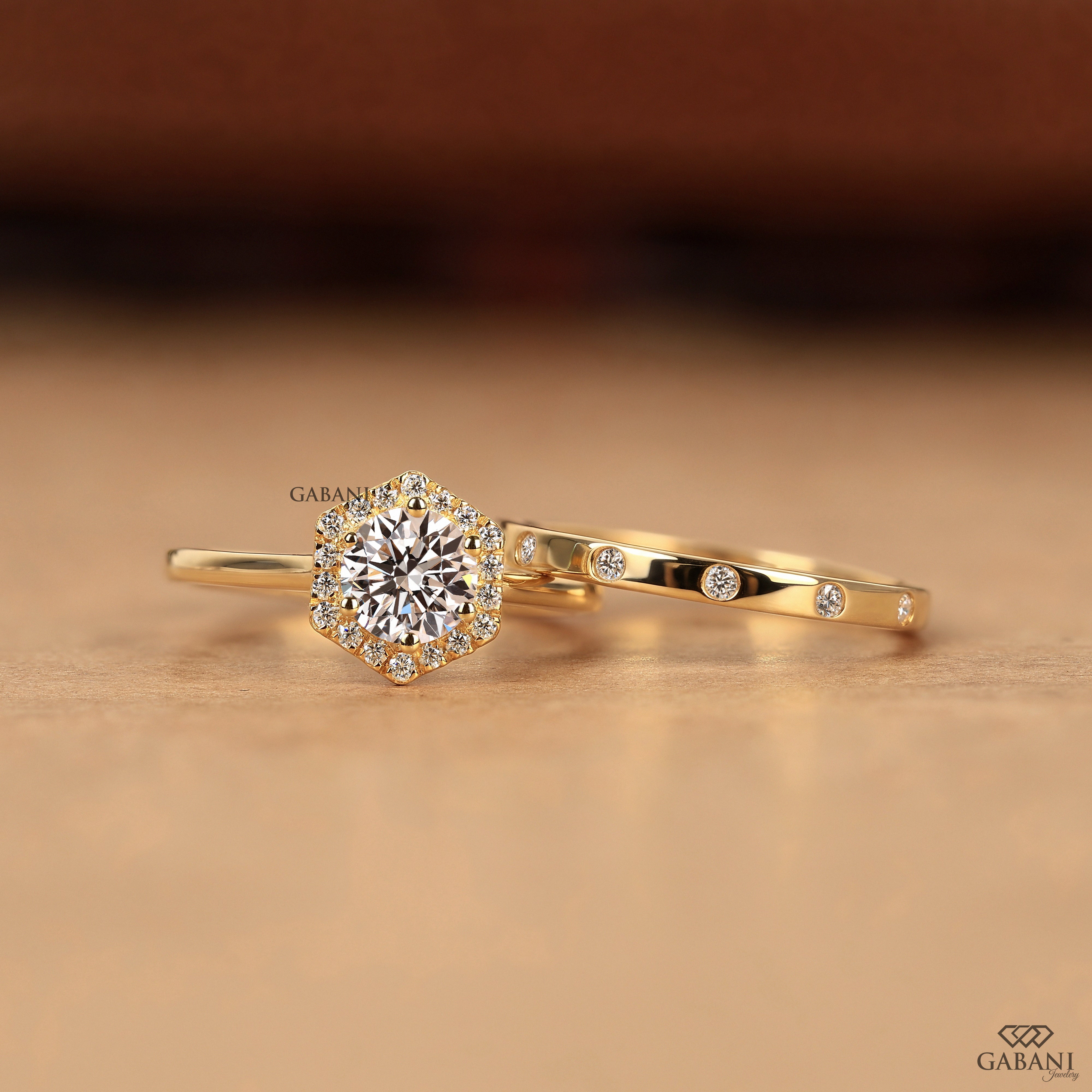 Round cut lab grown diamond engagement ring with hexagon halo, yellow gold band, IGI certified EF color and VS1 clarity.
