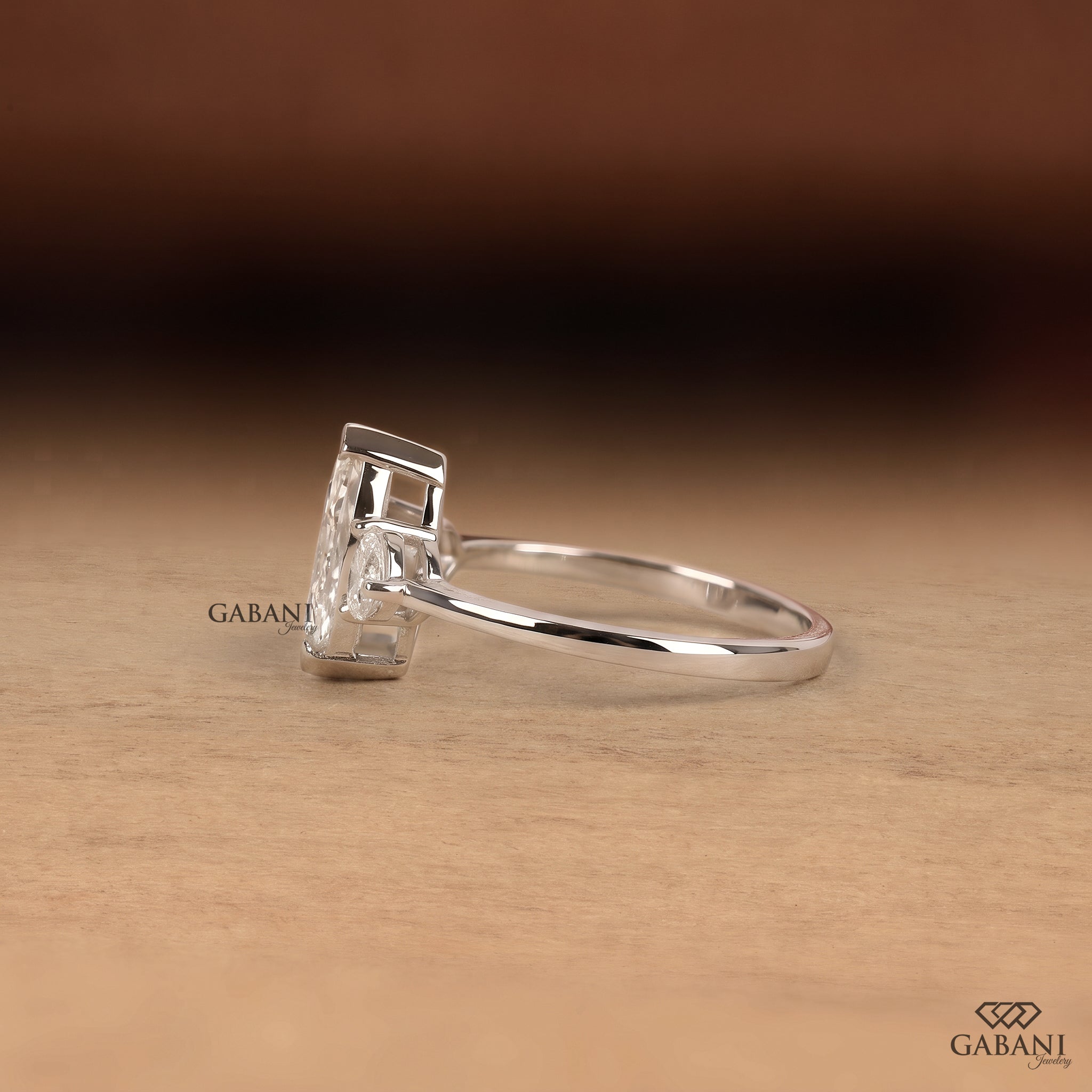 Marquise cut lab grown diamond engagement ring with heart shaped side stones