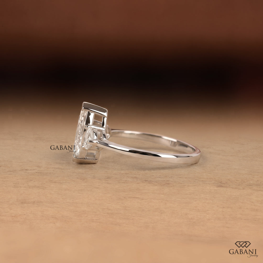 Marquise cut lab grown diamond engagement ring with heart shaped side stones
