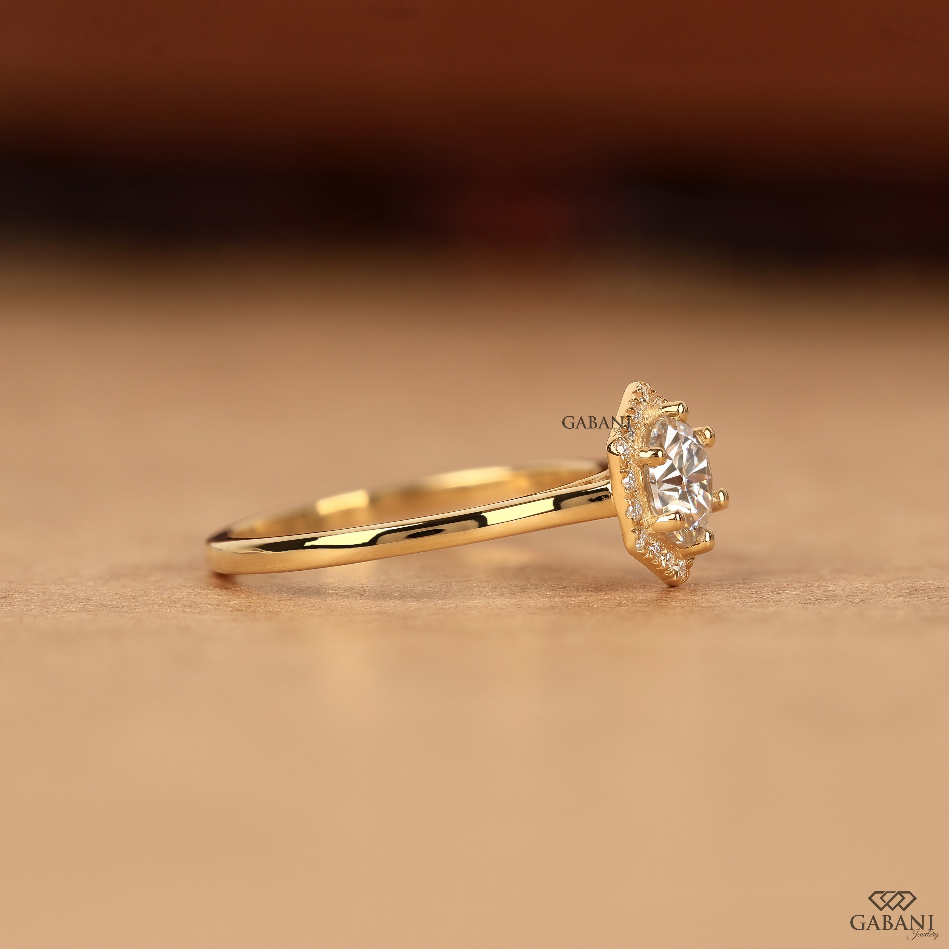 Round cut lab grown diamond engagement ring with hexagon halo, yellow gold band, IGI certified EF color and VS1 clarity.