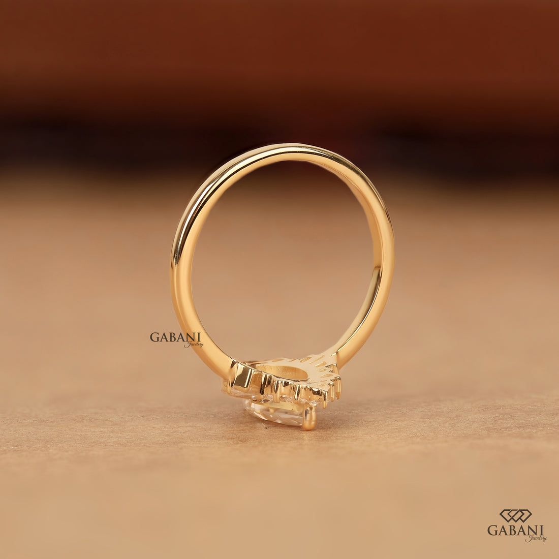 Marquise lab grown diamond engagement ring with floral halo, baguette side stones and yellow gold band, IGI certified EF color VS1 clarity.
