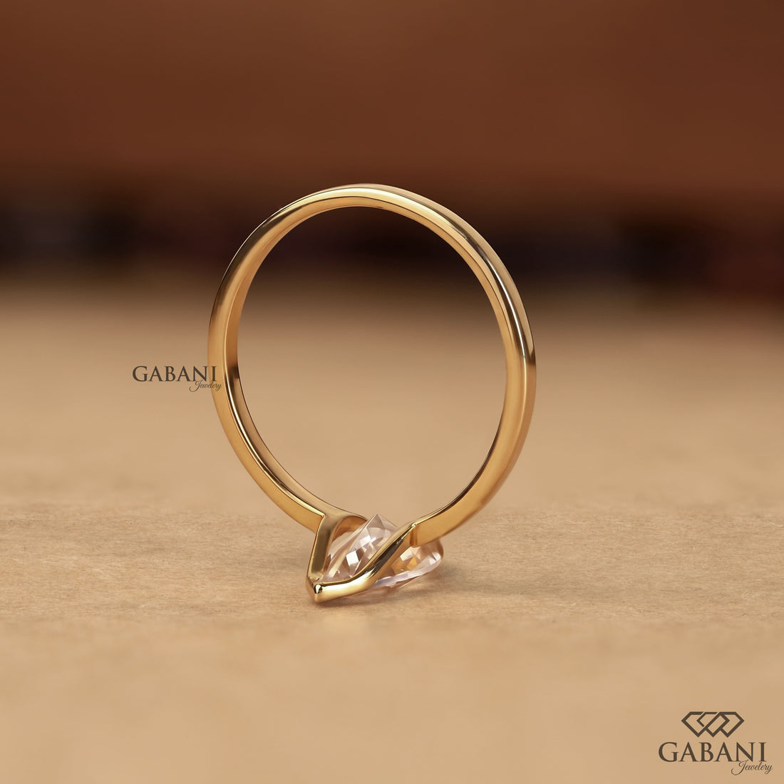 marquise scut lab grown diamond solitaire engagement ring with half bezel setting and polished 14K yellow gold band