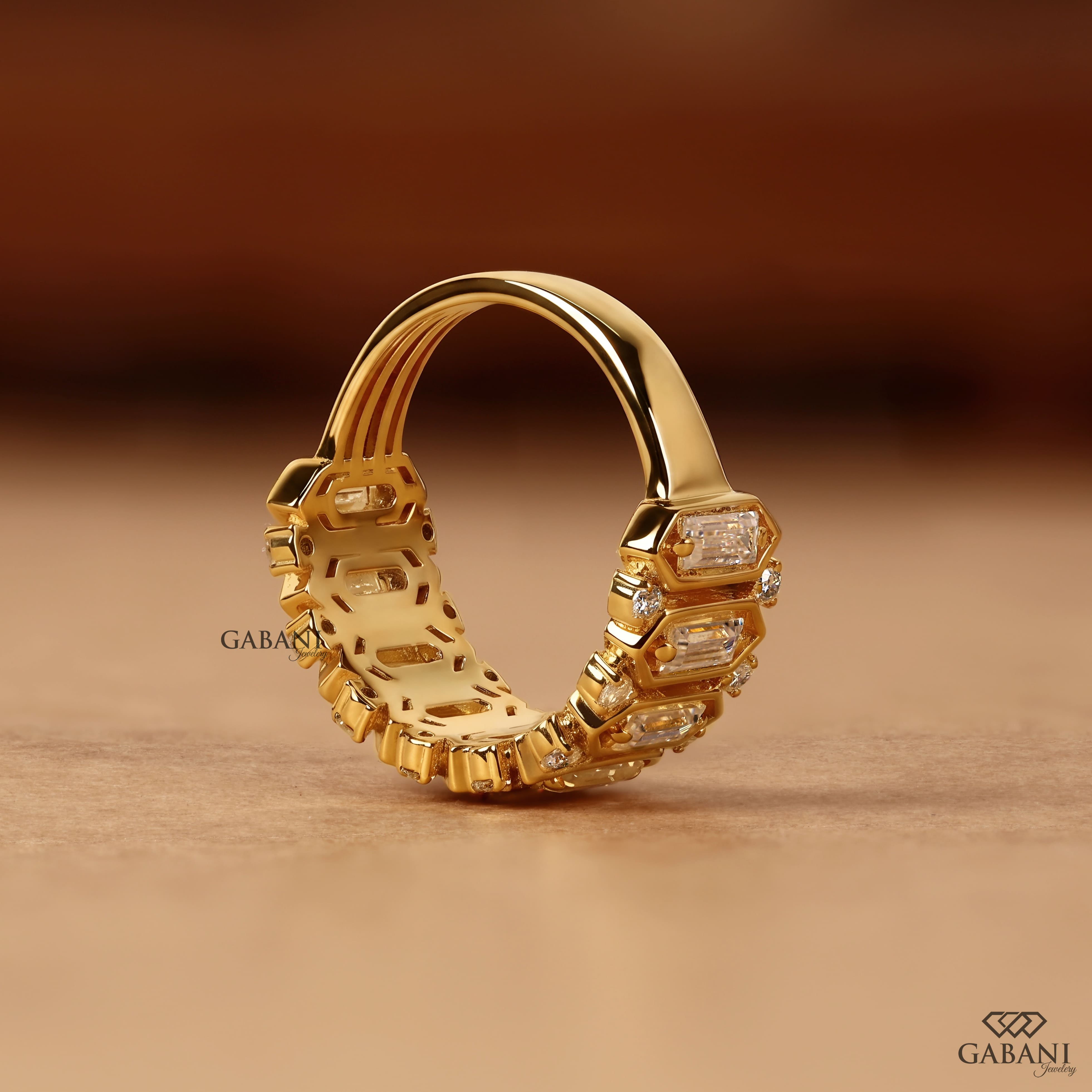 Emerald cut lab grown diamond wedding band in yellow gold with round diamond accents and a bold geometric design for bridal, anniversary, and statement wear.
