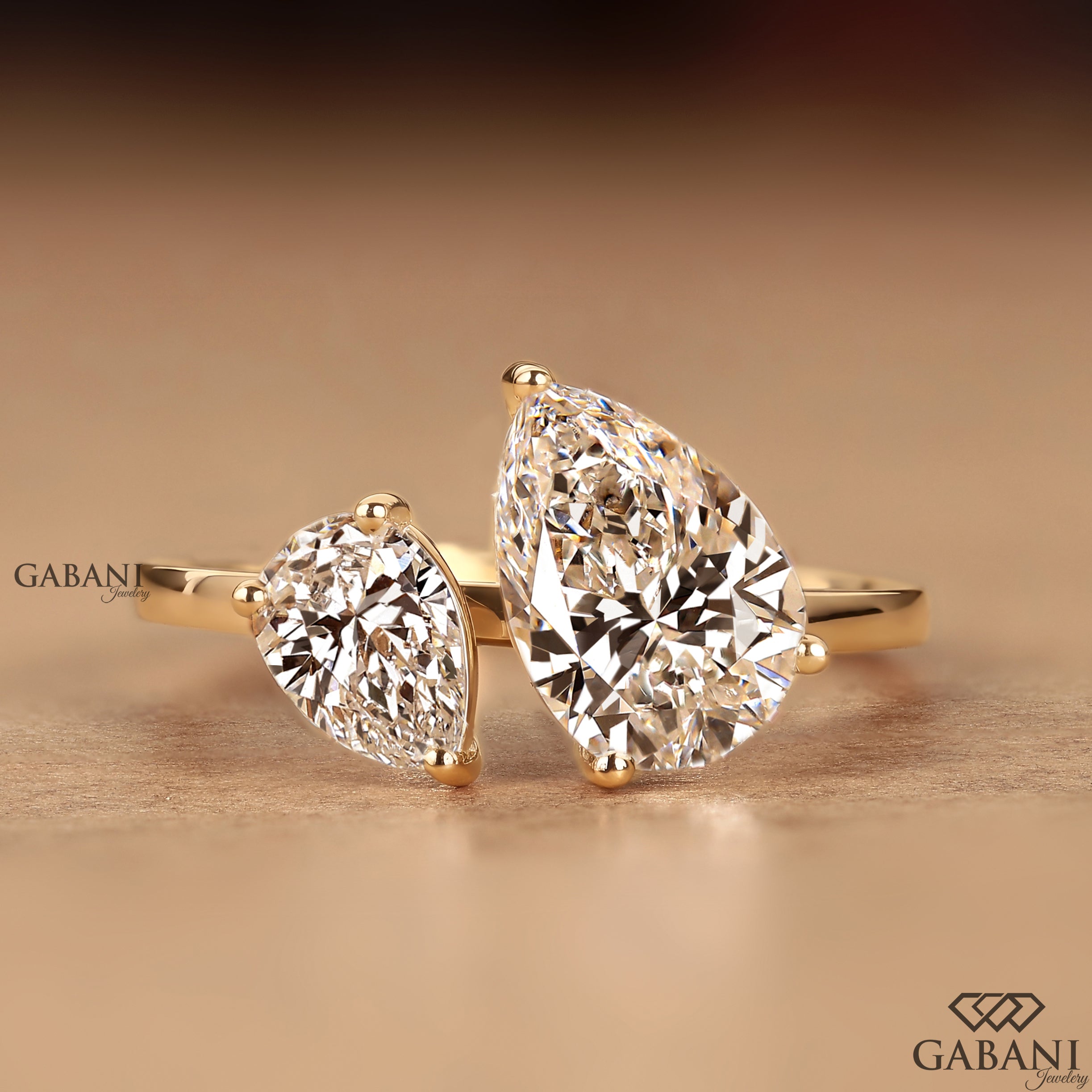 Two pear cut lab grown diamond Toi et Moi engagement ring