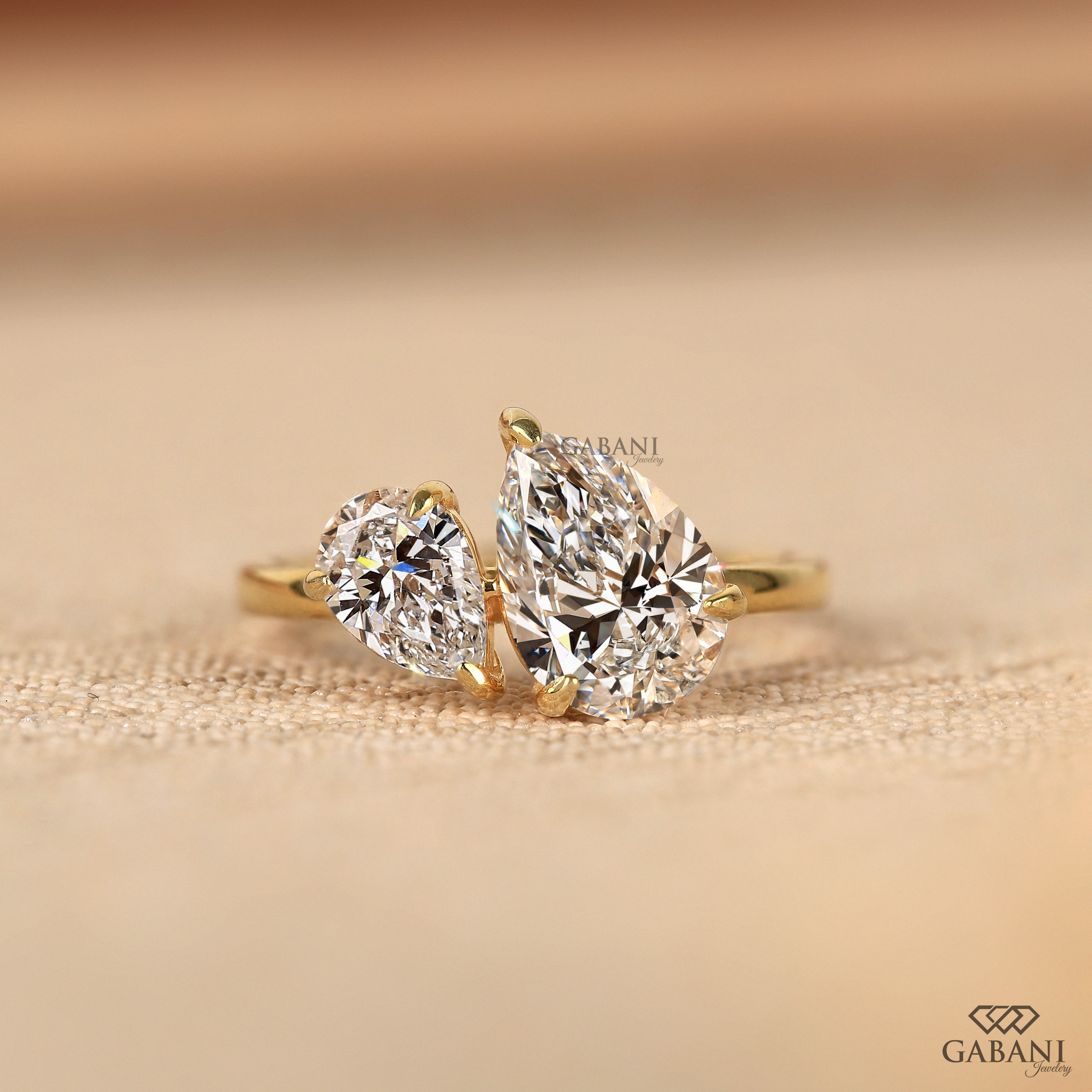 Two stone pear cut lab grown diamond proposal ring