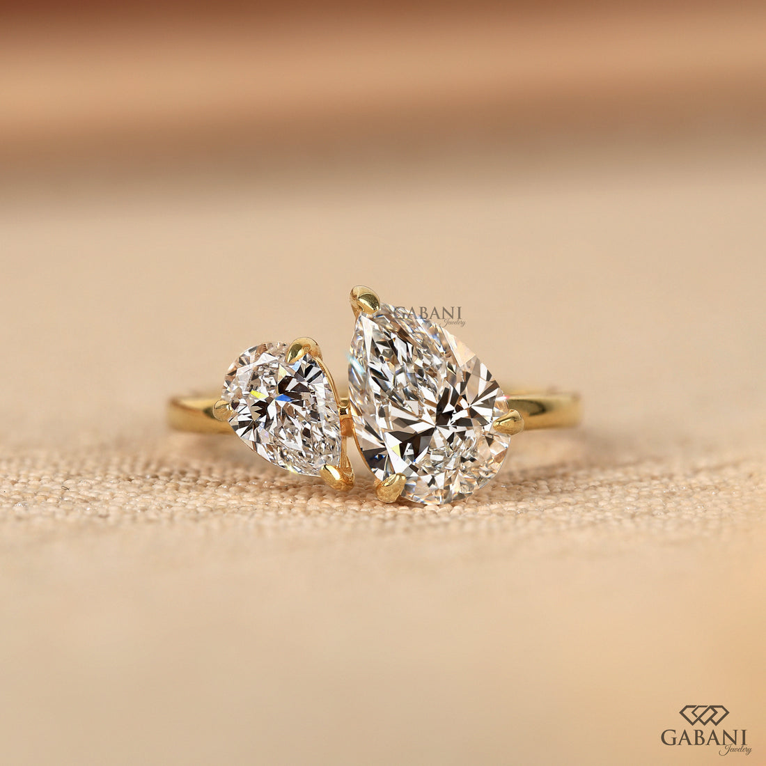 Two stone pear cut lab grown diamond proposal ring