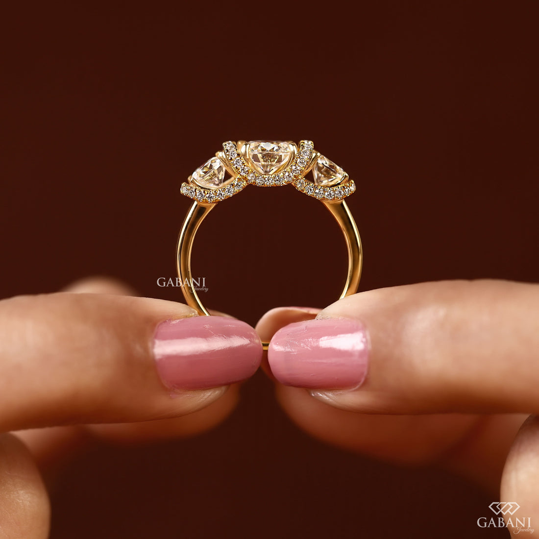 1.5 to 2 carat lab grown diamond engagement ring with cushion and pear cuts