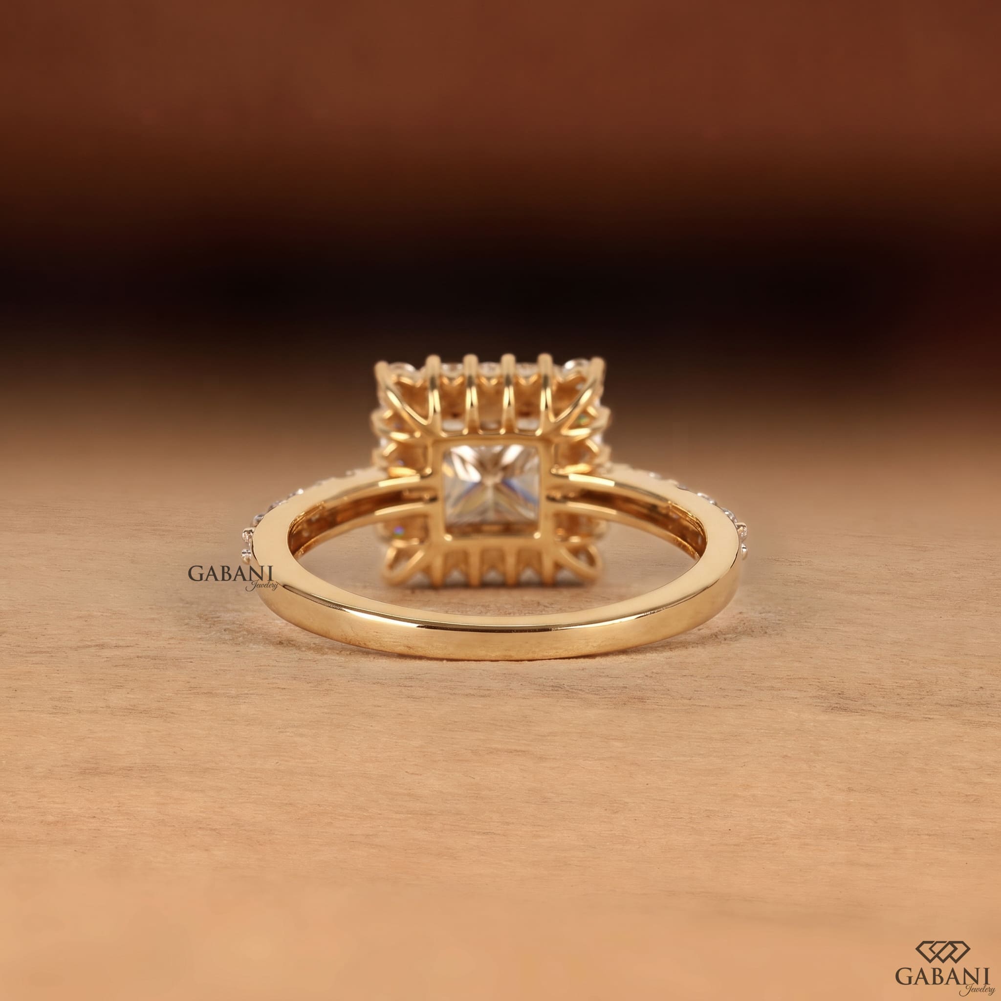 Princess cut lab grown diamond engagement ring in yellow gold featuring a round diamond halo and pave diamond band, designed as a bridal, proposal, anniversary, or engagement ring.
