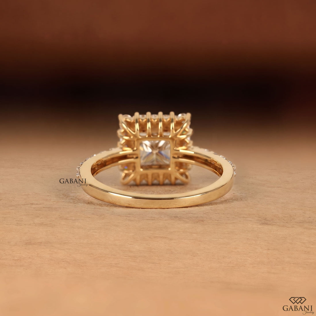 Princess cut lab grown diamond engagement ring in yellow gold featuring a round diamond halo and pave diamond band, designed as a bridal, proposal, anniversary, or engagement ring.