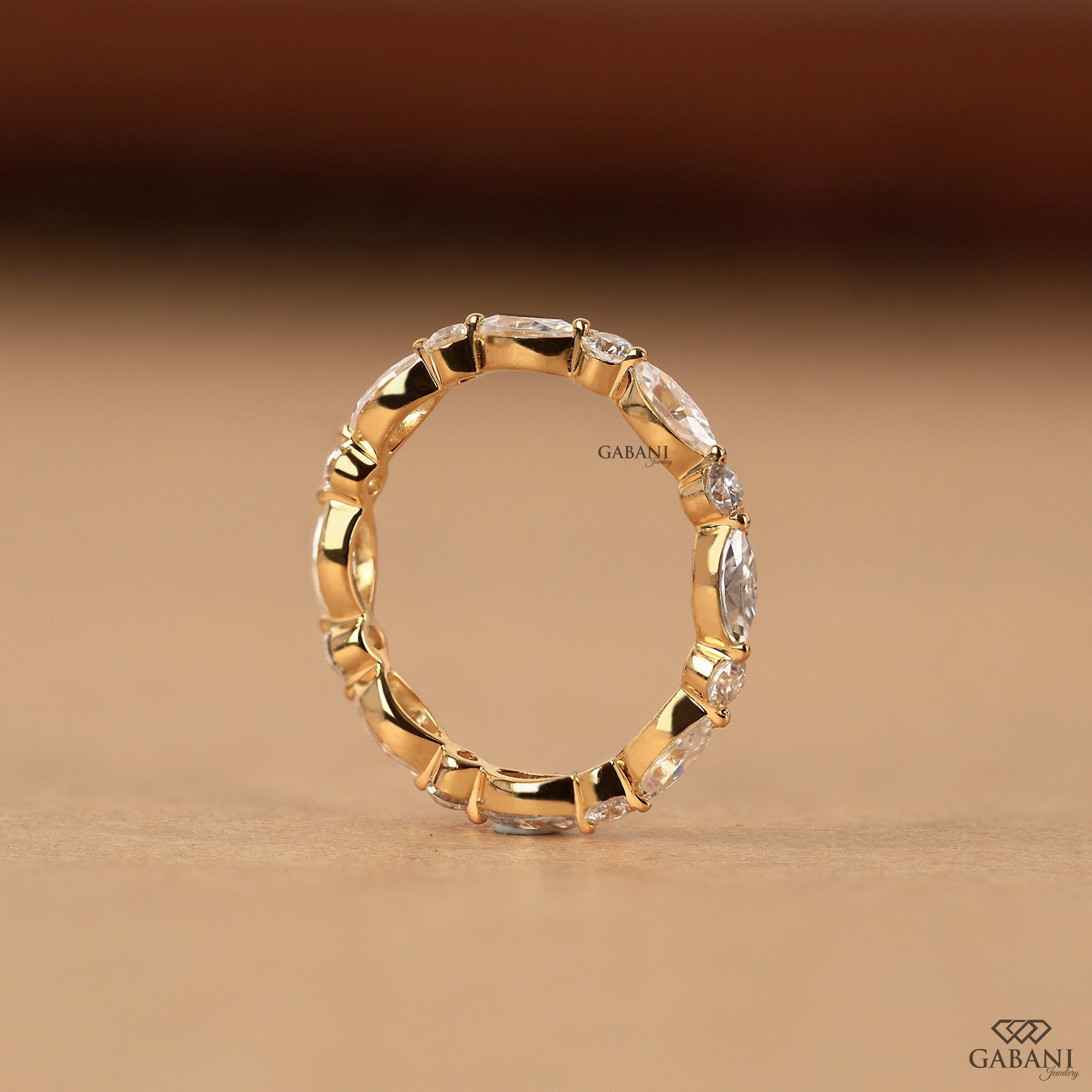 marquise diamond eternity band with round lab diamonds in gold