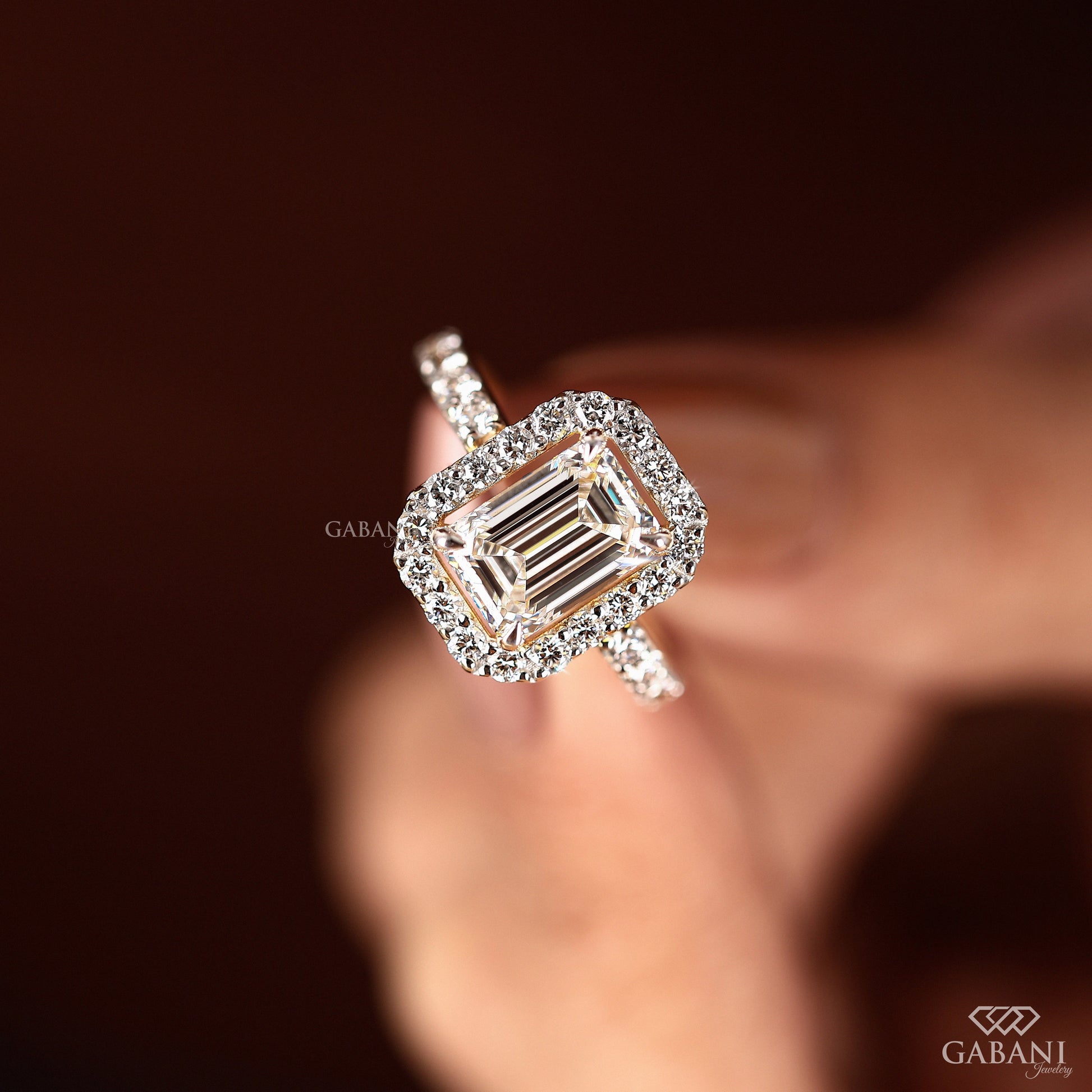 timeless emerald cut lab grown diamond ring with halo setting in yellow gold