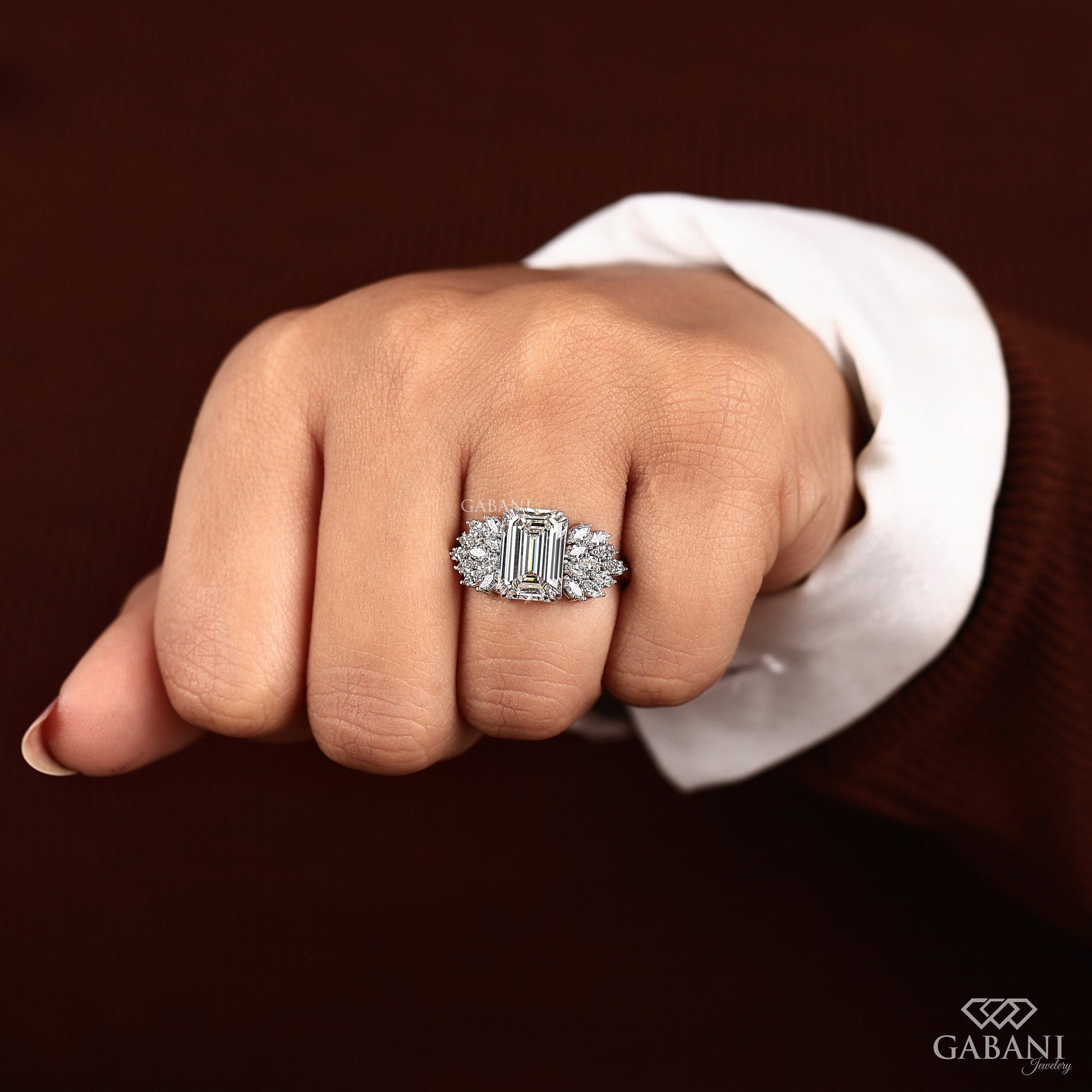 chunky emerald cut lab grown diamond ring with marquise side diamonds in 14k white gold