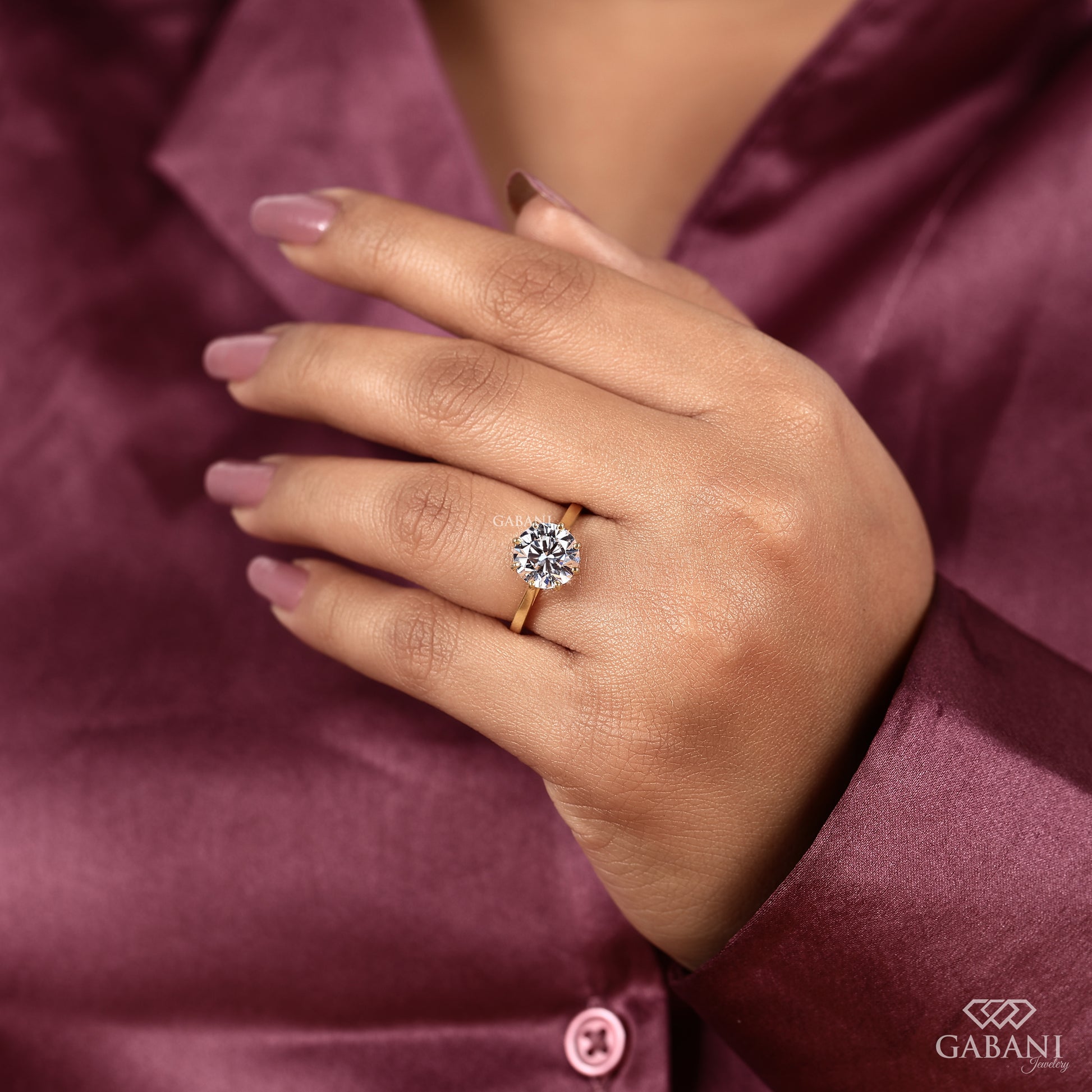 round cut IGI certified lab grown diamond ring in yellow gold solitaire style