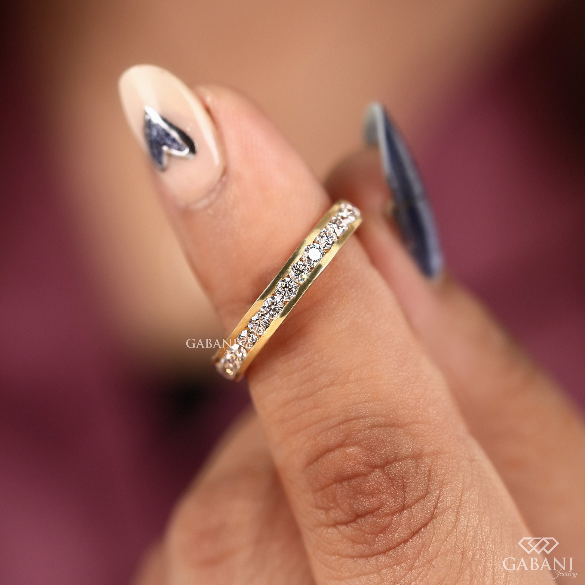 round lab grown diamond wedding band in 14k yellow gold channel set style