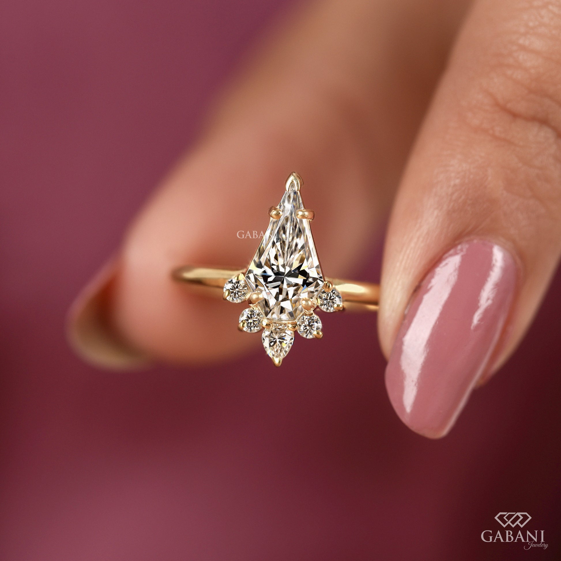 lab grown diamond engagement ring with kite center stone and vintage inspired details