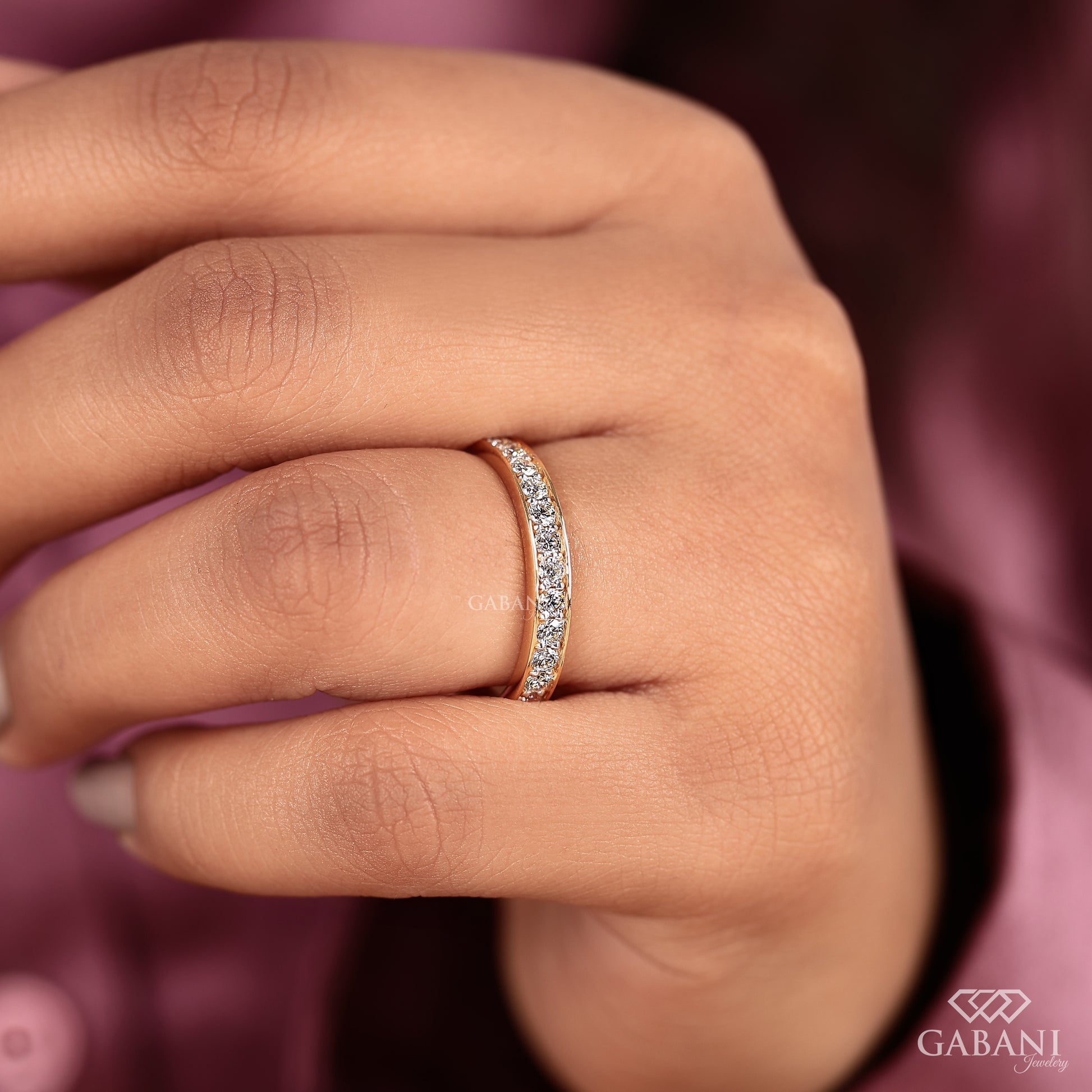 slim yellow gold eternity ring with pavé set round diamonds