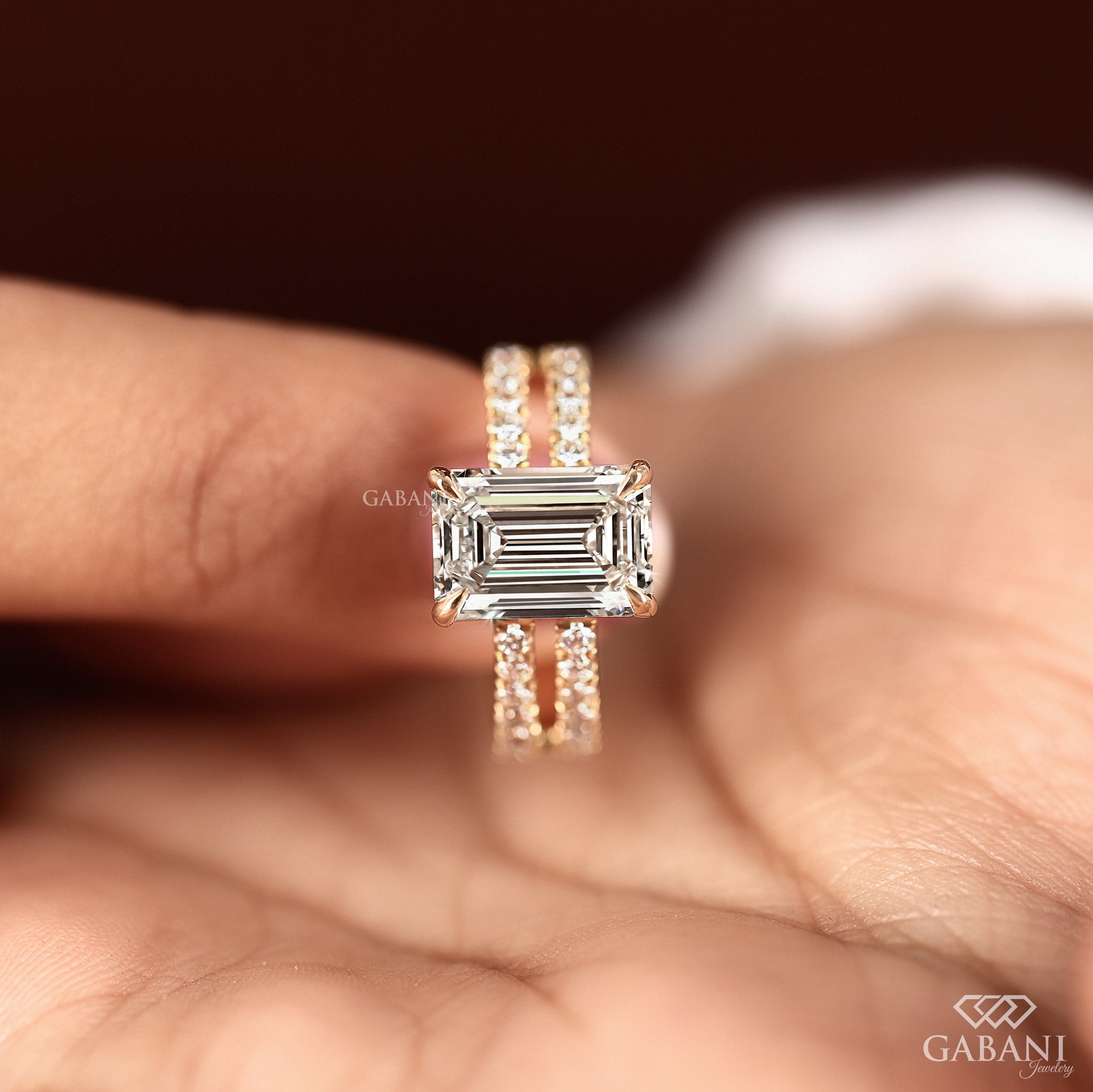 Double shank engagement ring with emerald cut lab grown diamond
