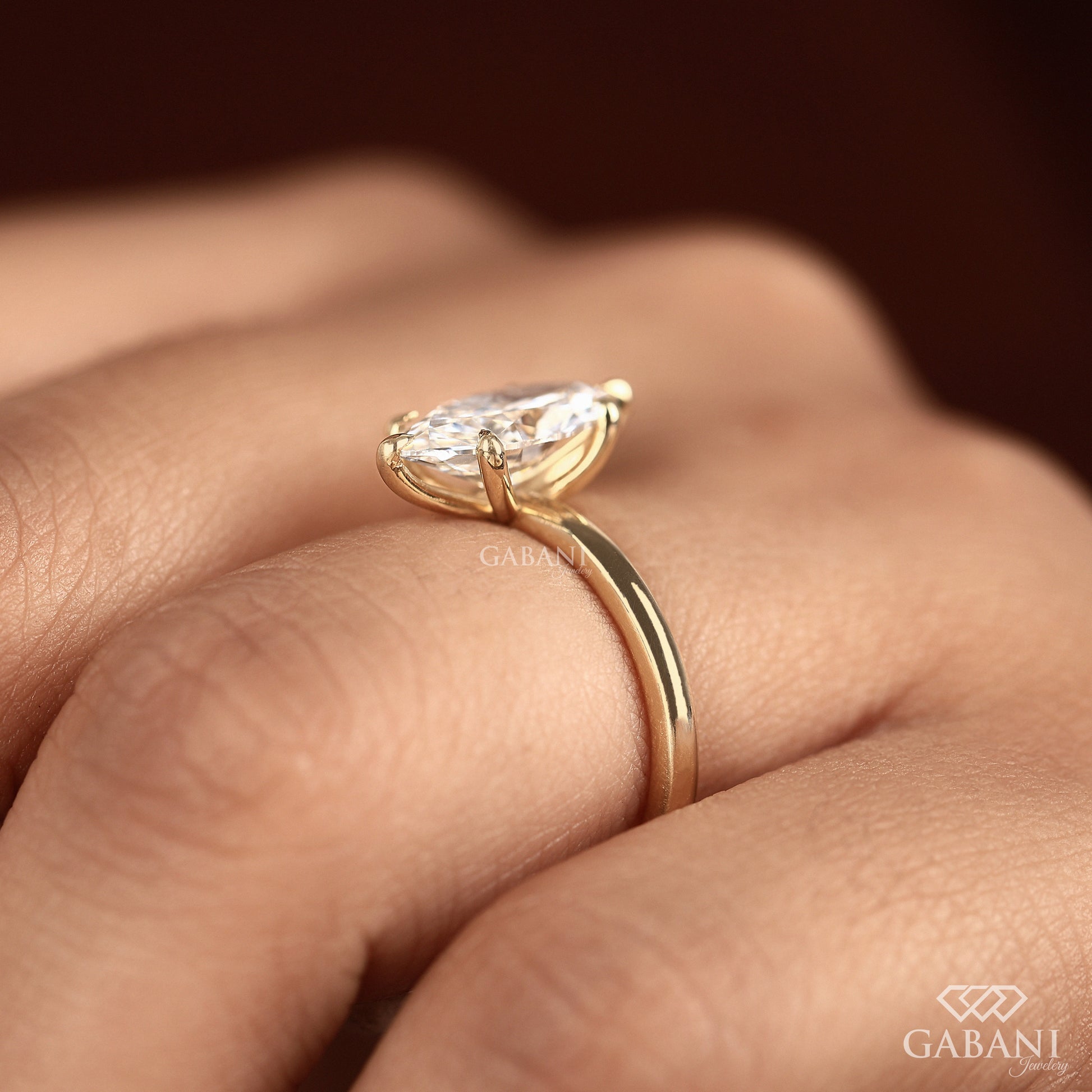 Slim band marquise solitaire lab grown diamond ring
