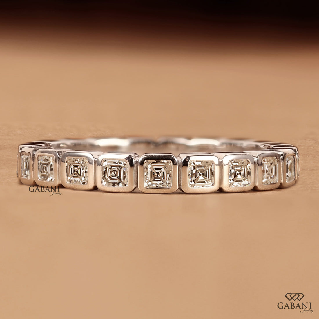 Asscher cut lab grown diamond full eternity band in white gold with bezel set EF color VS1 clarity diamonds, designed as a wedding, anniversary, bridal, or stackable ring.