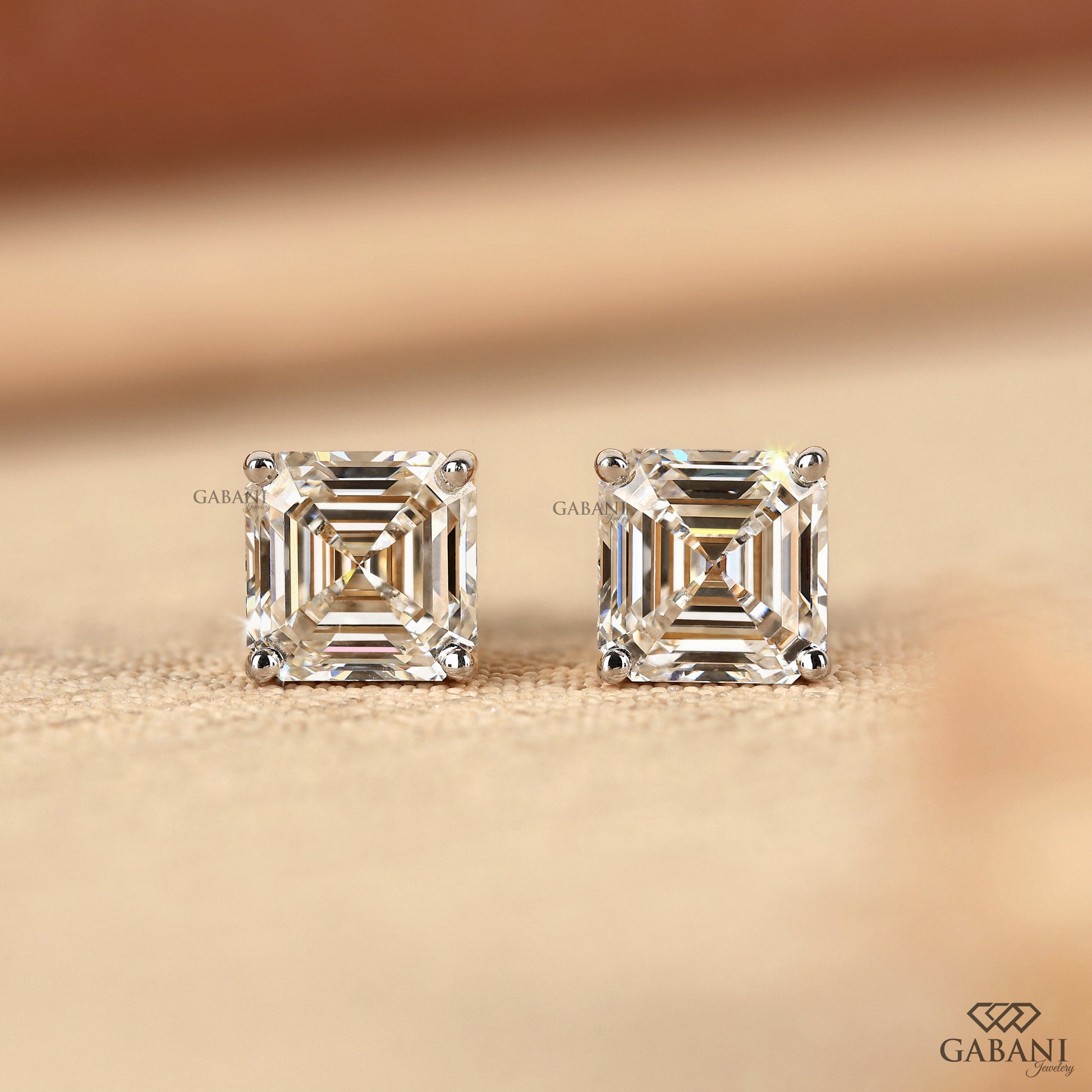 Asscher cut lab grown diamond stud earrings in yellow gold with white button prong setting