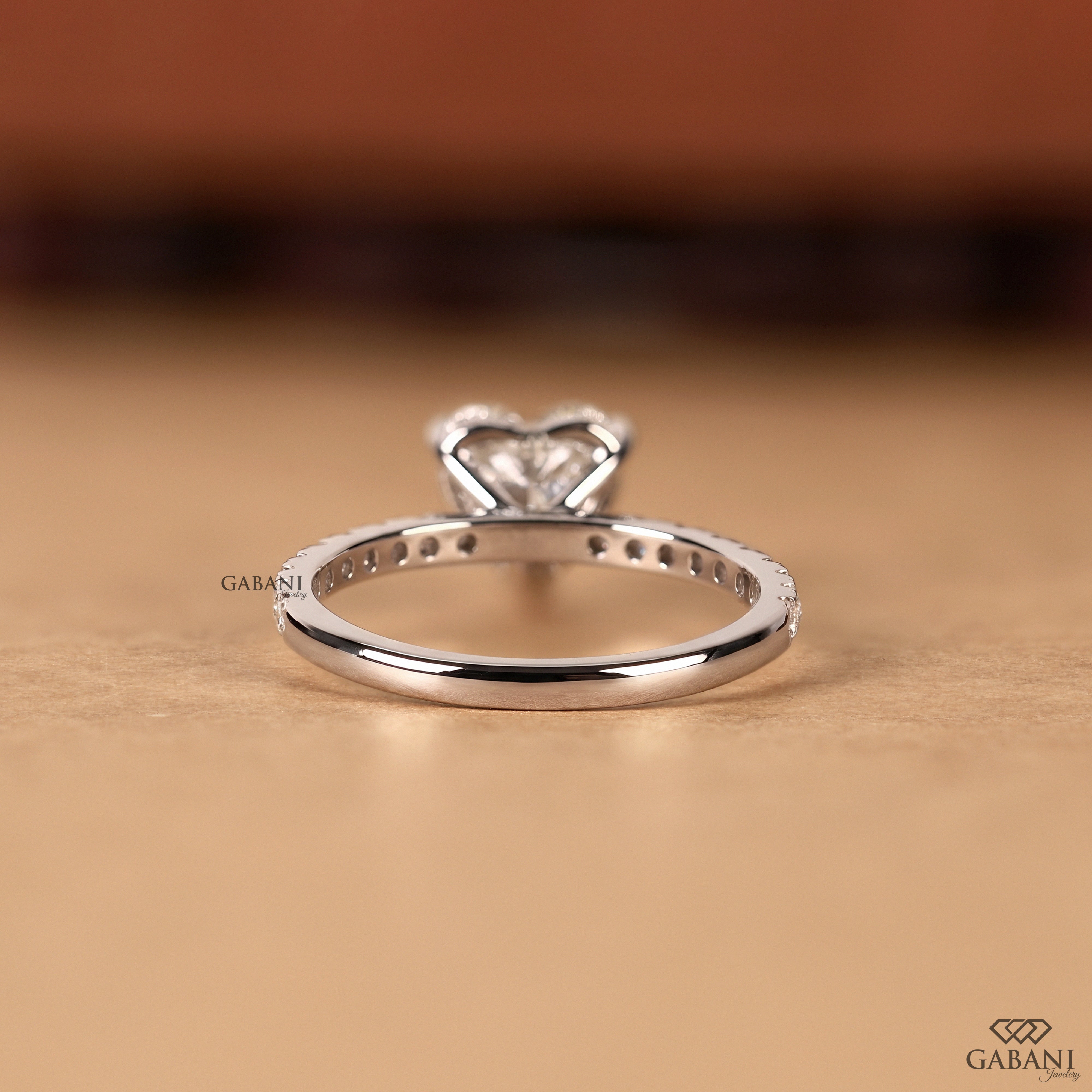 Heart cut lab grown diamond ring designed for wedding band pairing