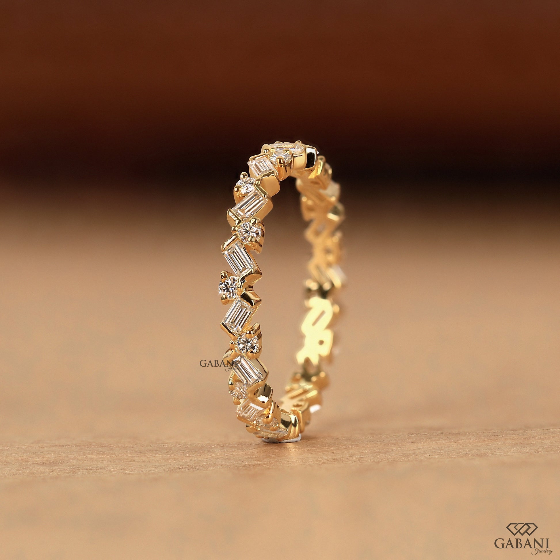 Round and baguette diamond matching band in solid yellow gold