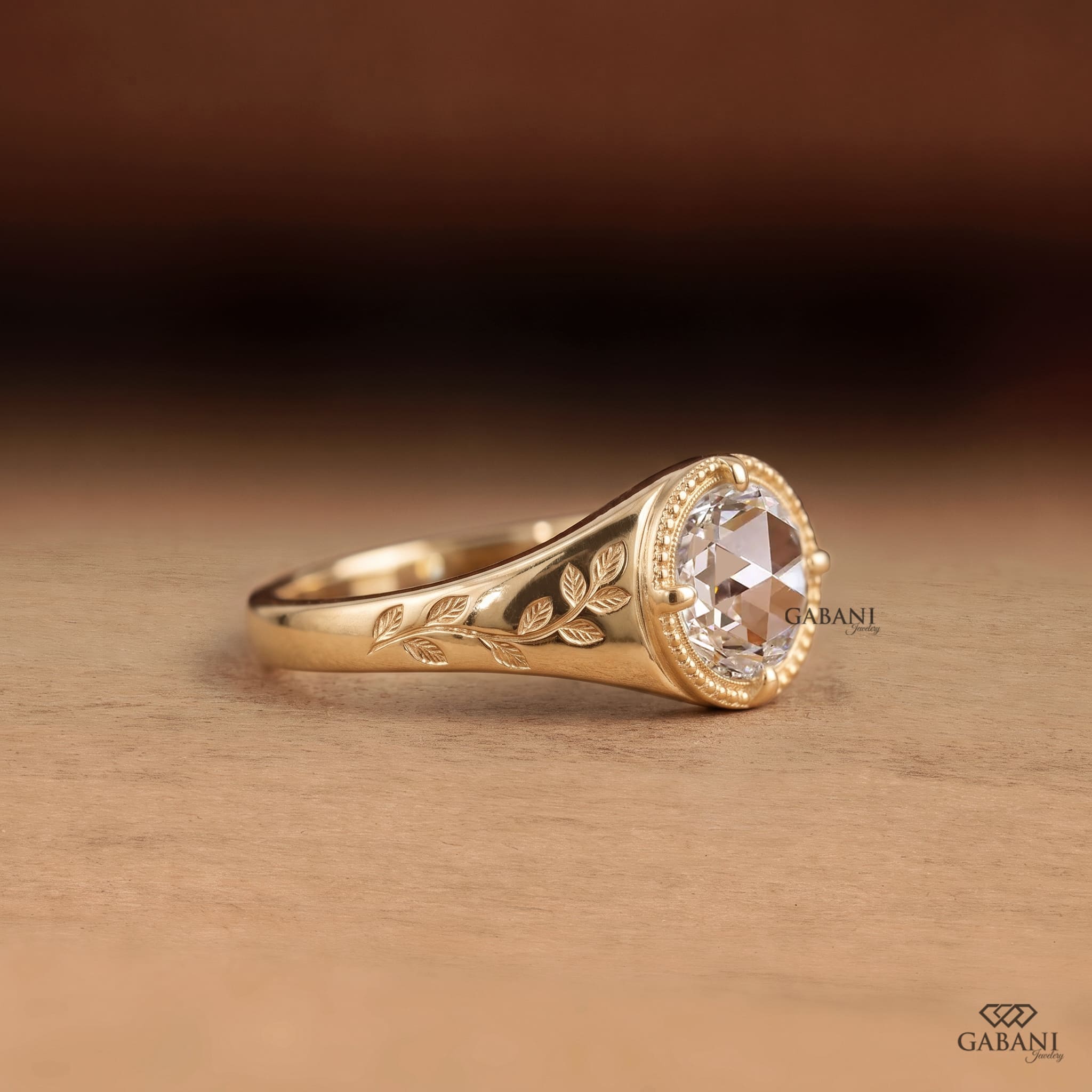 beaded detailing and yellow gold band.