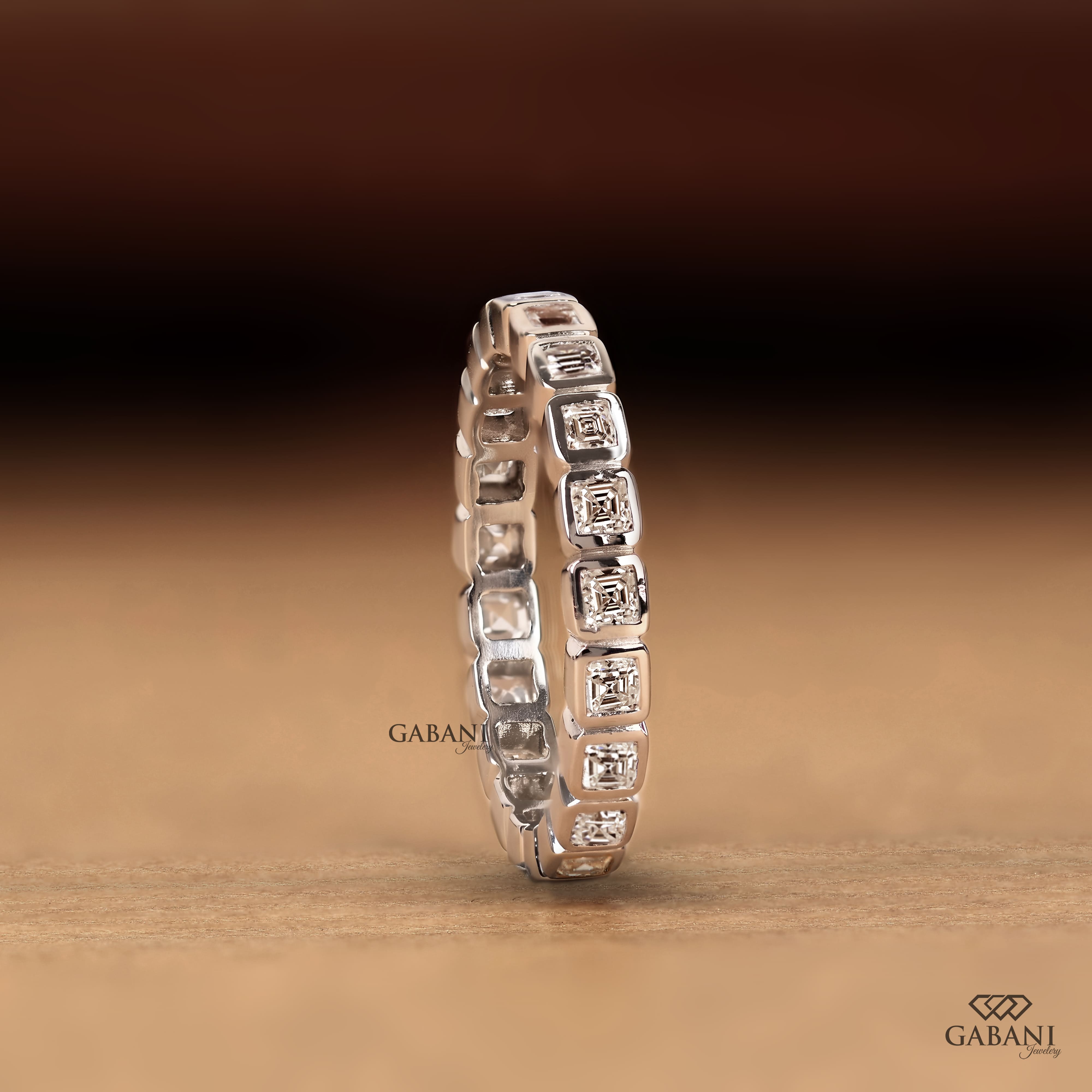 Asscher cut lab grown diamond full eternity band in white gold with bezel set EF color VS1 clarity diamonds, designed as a wedding, anniversary, bridal, or stackable ring.