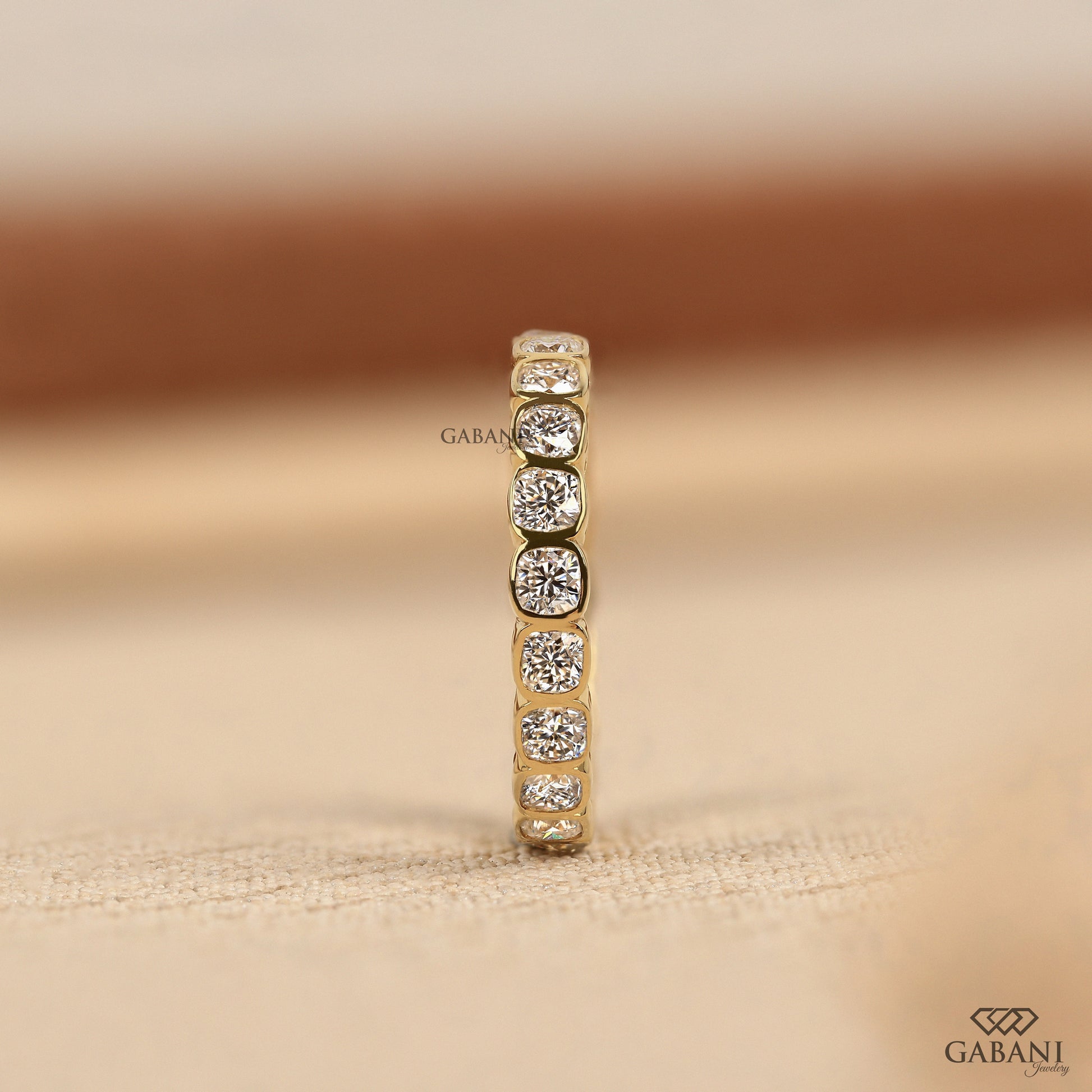 Cushion cut lab grown diamond band with full eternity layout and smooth comfortable profile