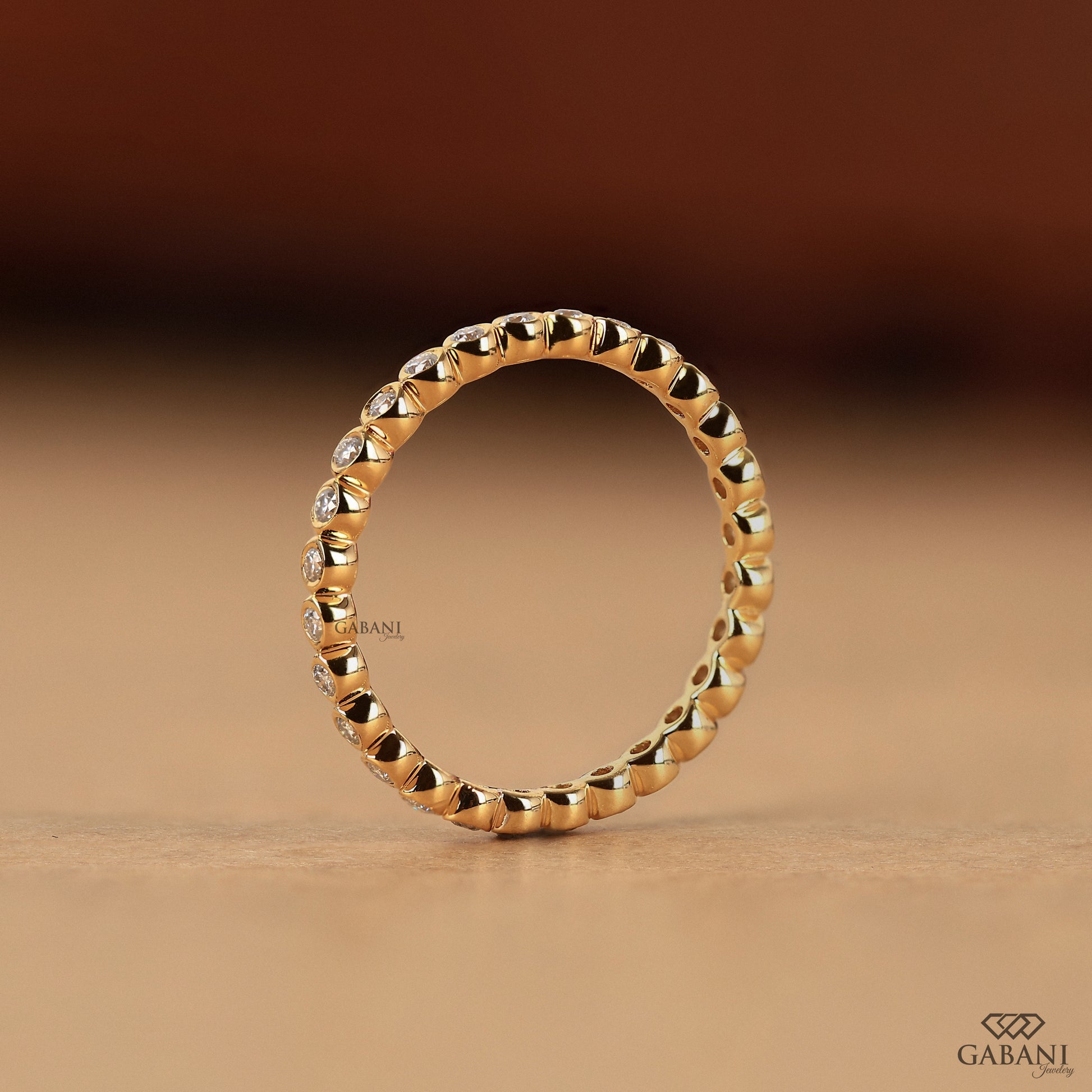 simple bezel set lab grown diamond band in gold, dainty thin stacking ring for her