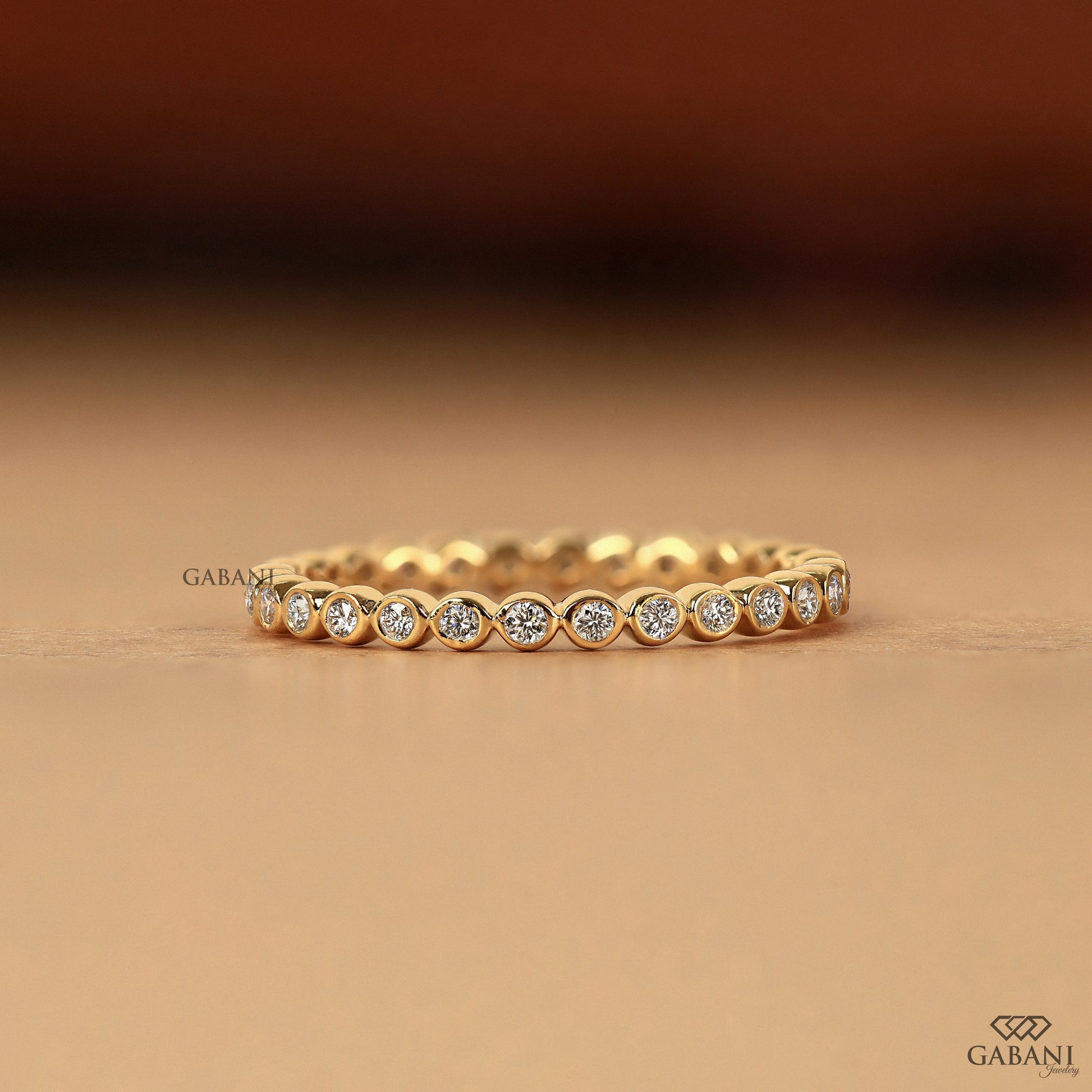 gabani jewelry bezel set lab grown diamond band in gold, dainty thin wedding ring for stacking