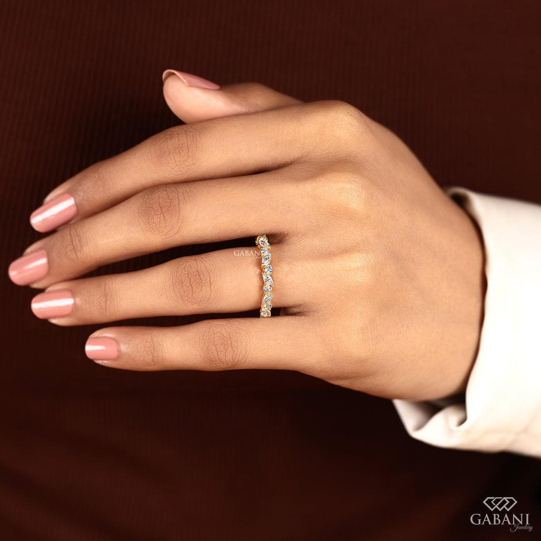 Handmade marquise and round diamond bridal ring in solid gold with a half eternity band style