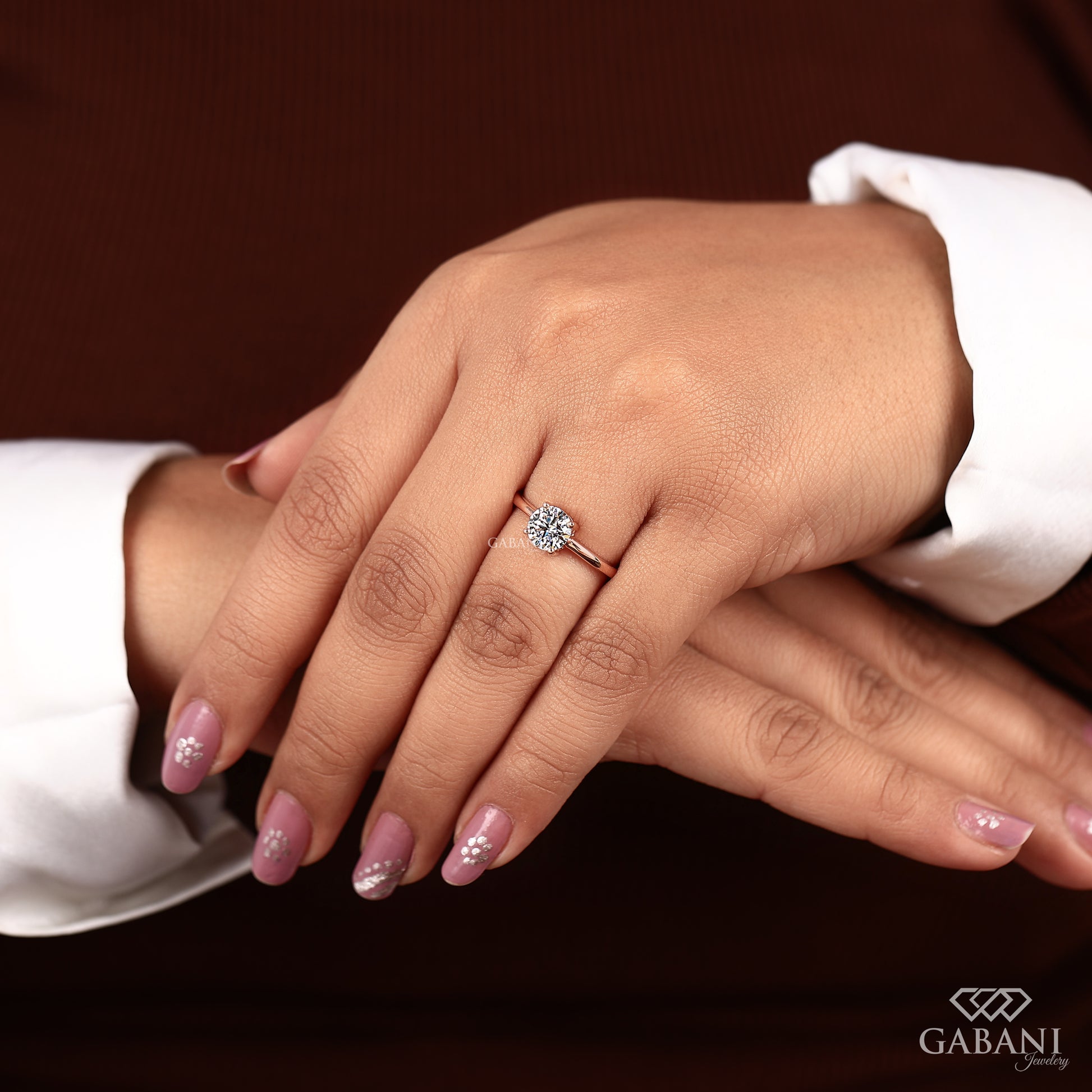 14k solid rose gold solitaire ring with round lab grown diamond and four prong setting