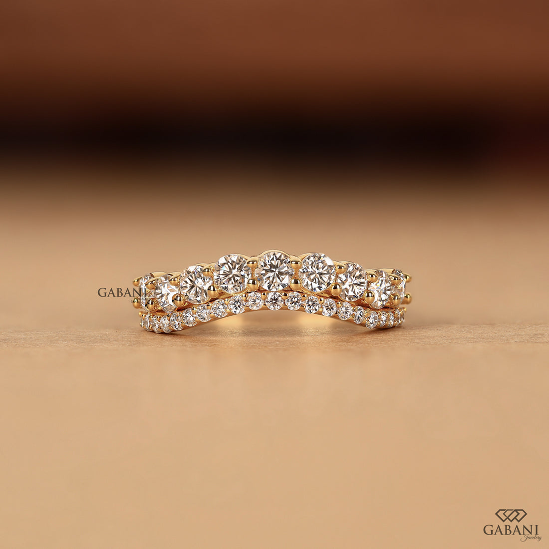 Curved diamond stacking band for engagement ring