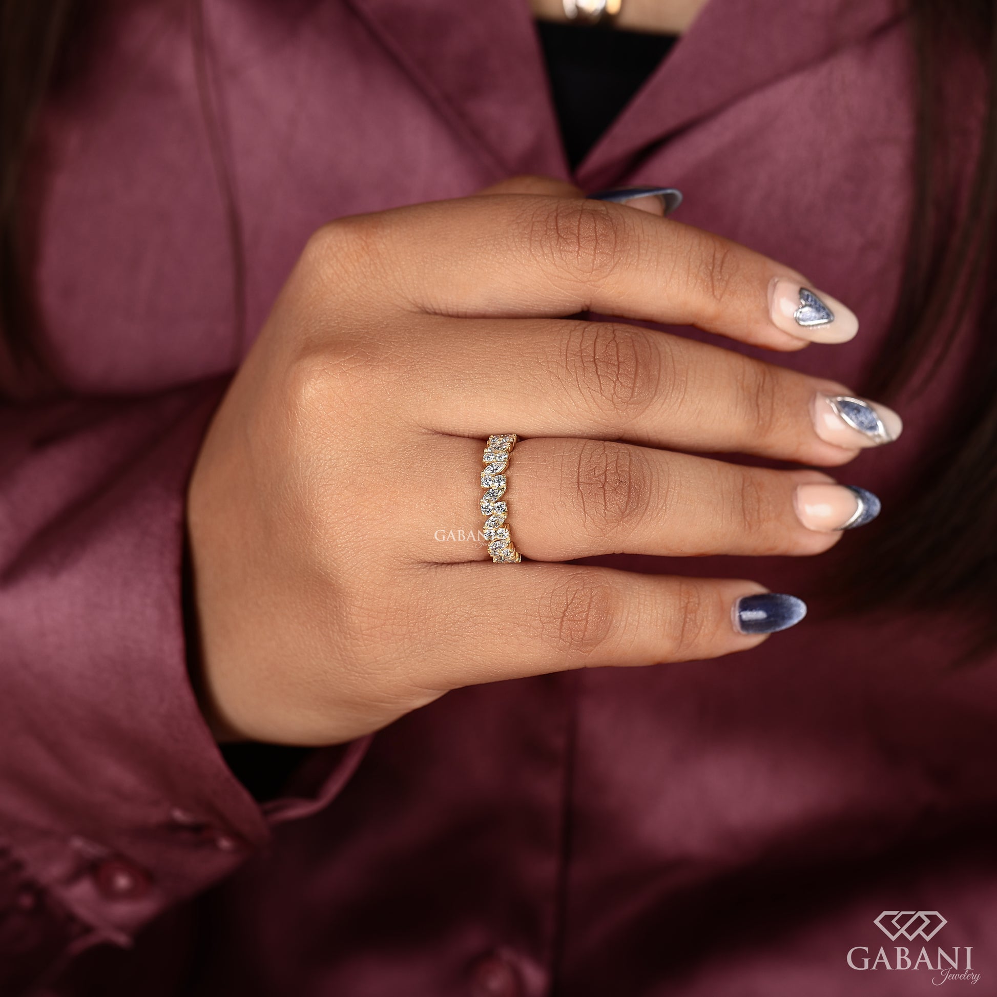 modern diamond band with marquise and round lab grown diamonds arranged in a half eternity yellow gold ring