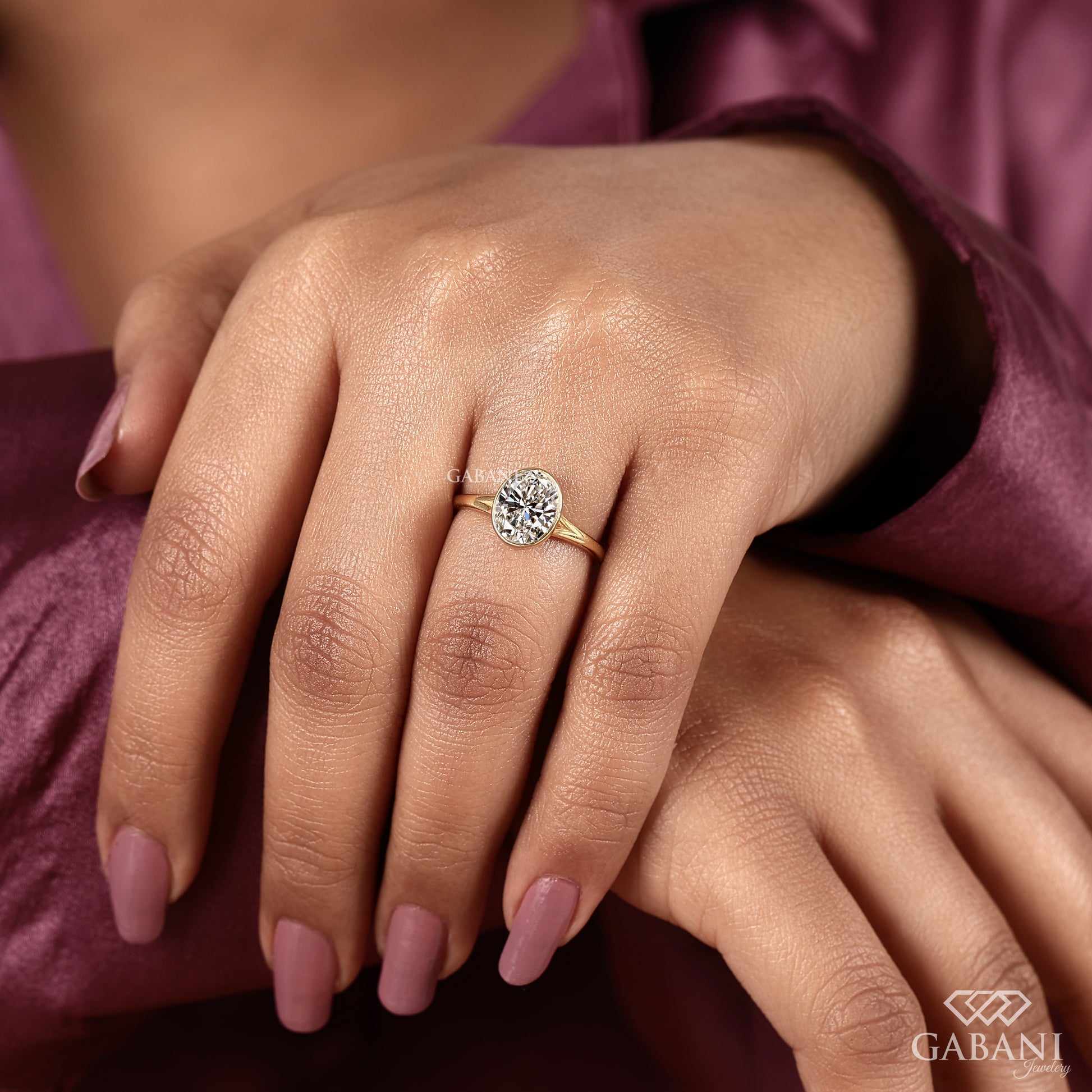 Oval IGI certified lab grown diamond ring with bezel setting