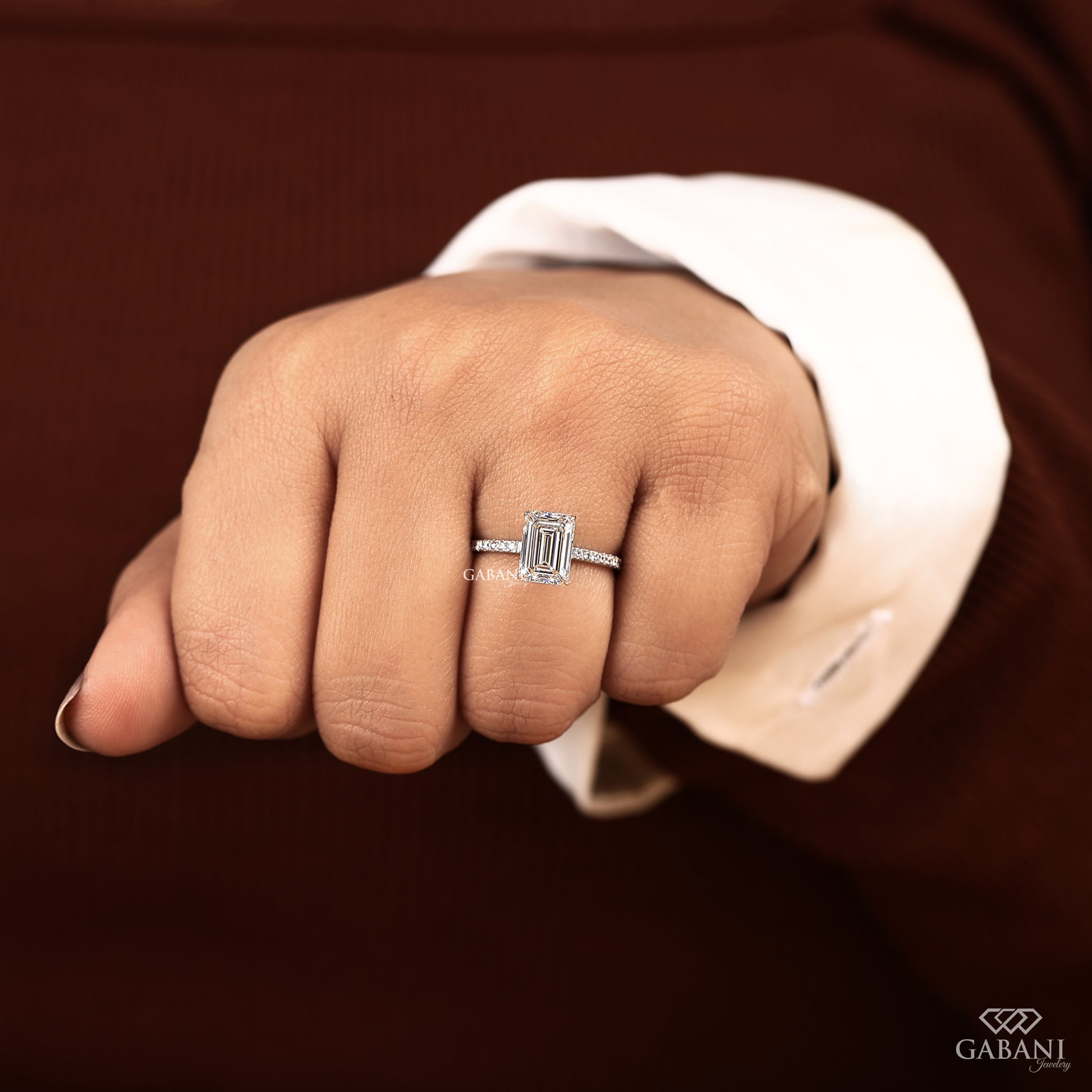 emerald cut lab grown diamond ring designed as a minimalist solitaire in solid white gold