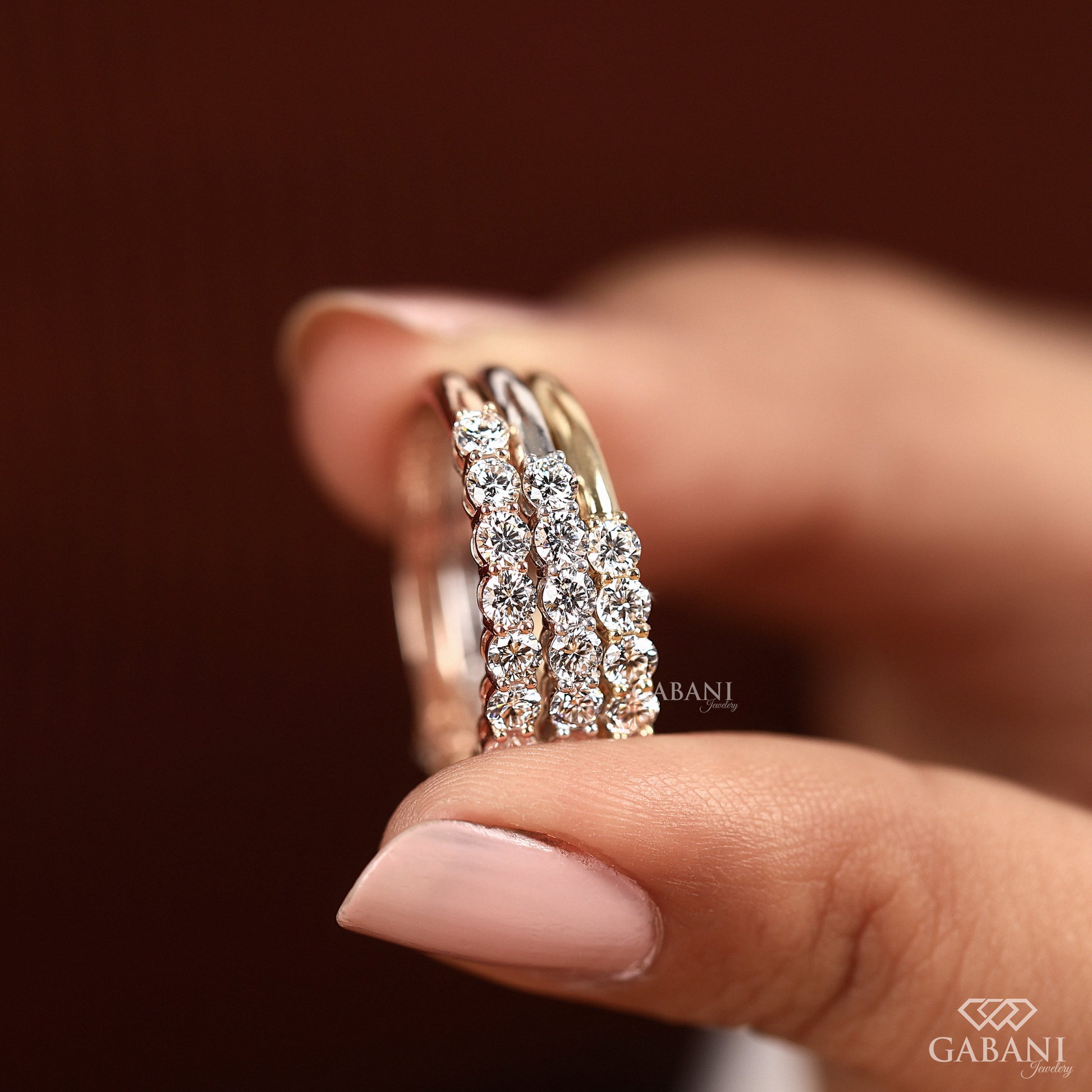 Slim shared prong round lab grown diamond wedding band in white gold