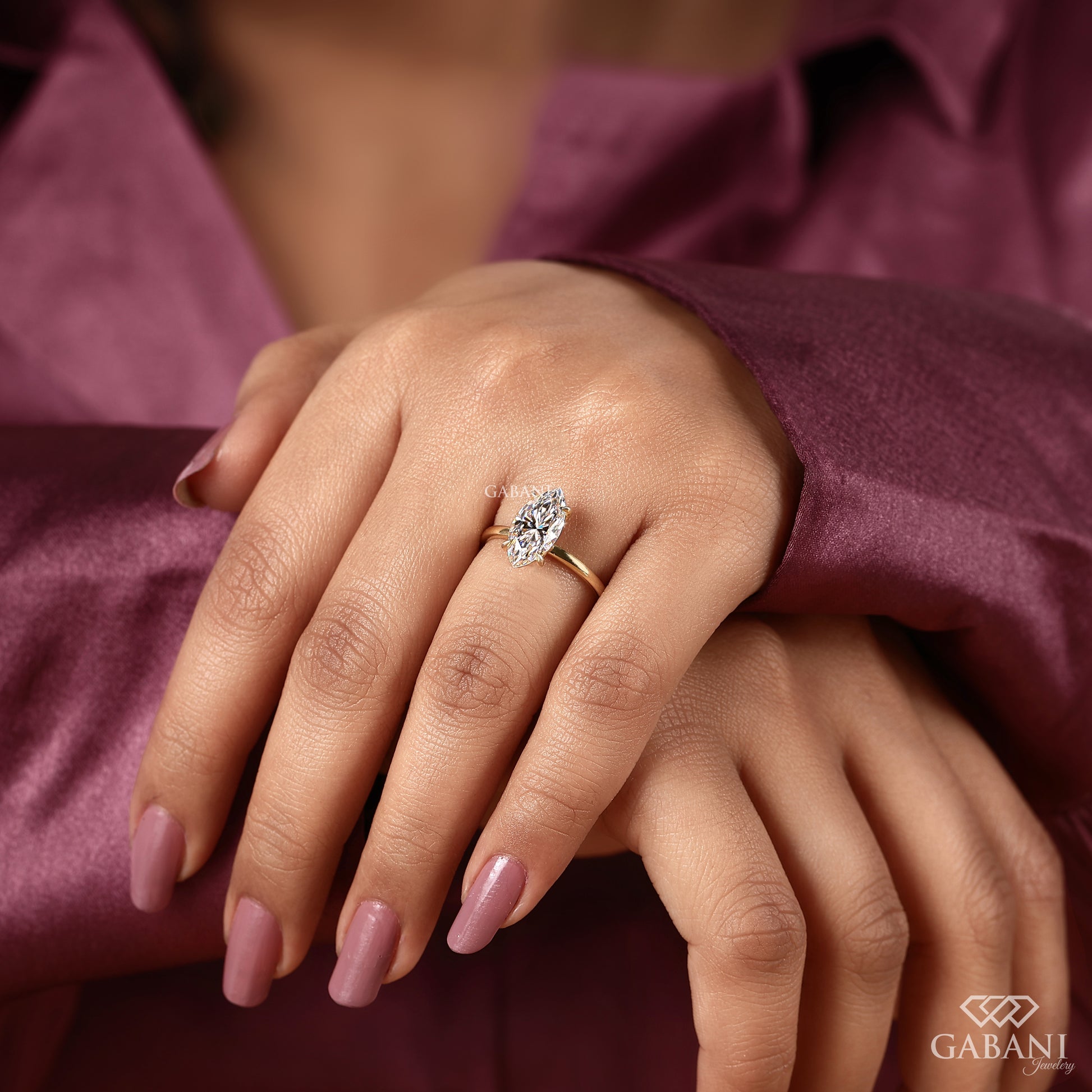 prong set solitaire ring with marquise cut lab grown diamond and smooth pipe shank