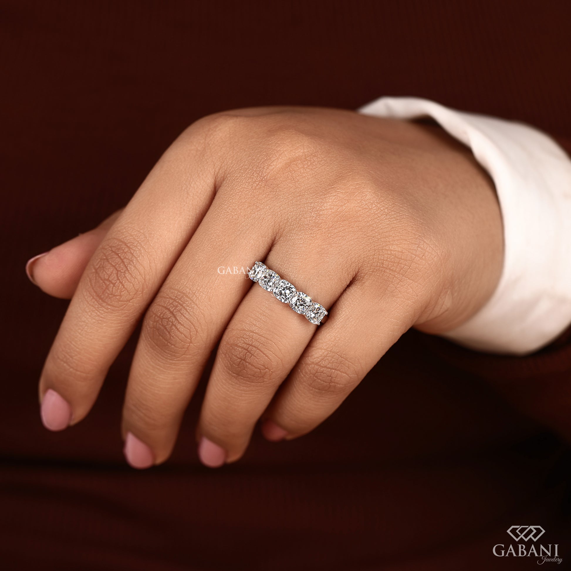 Cushion cut lab diamond five stone band with U prong setting in white gold