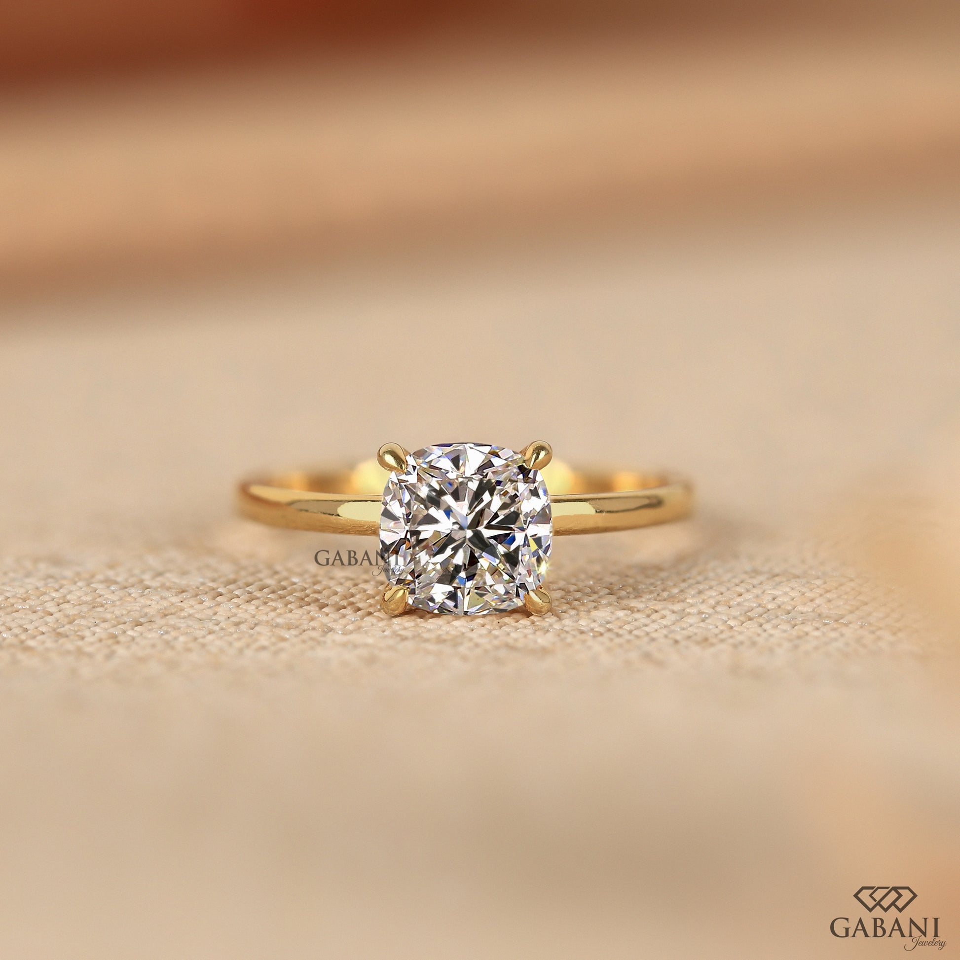 cushion cut lab grown diamond solitaire ring with pipe shank band