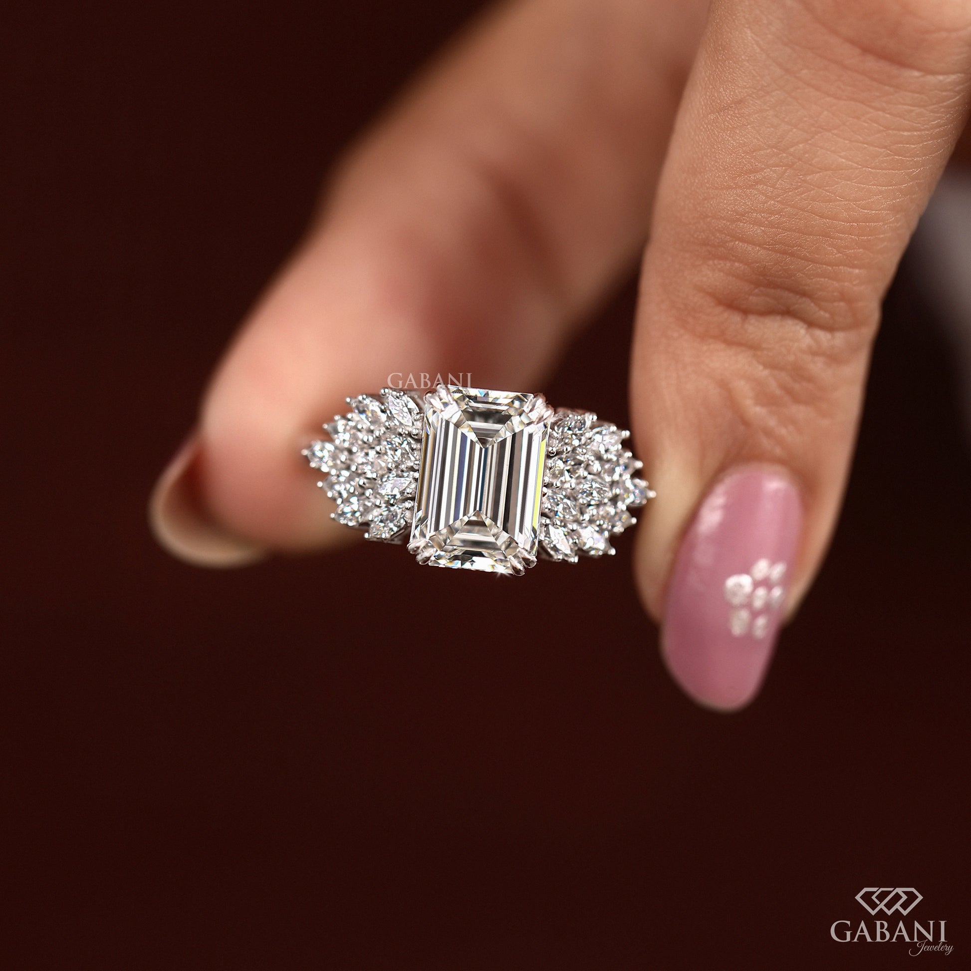 emerald cut lab grown diamond ring with double claw prongs and thick white gold band