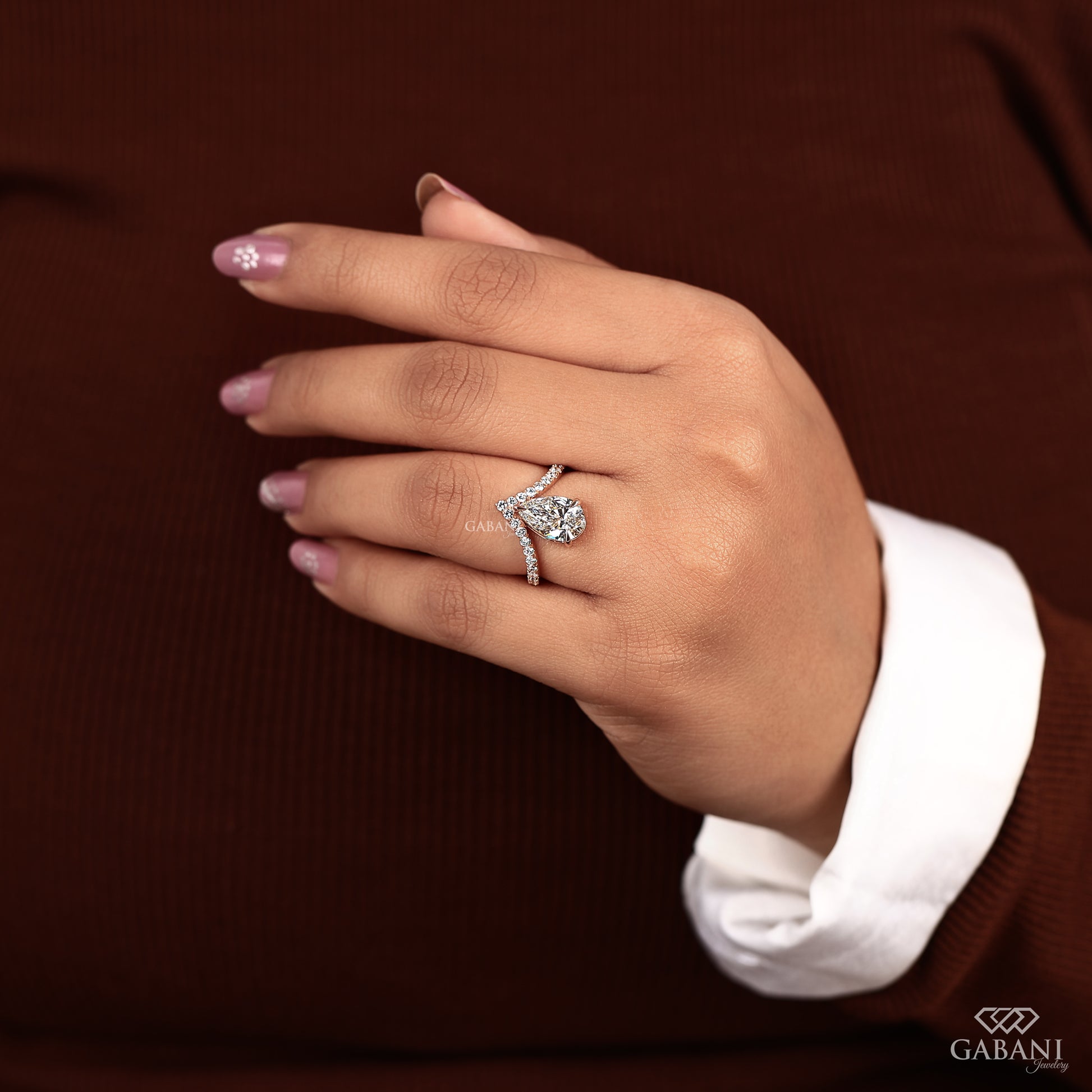 Pear shaped IGI certified lab grown diamond ring with claw prong setting