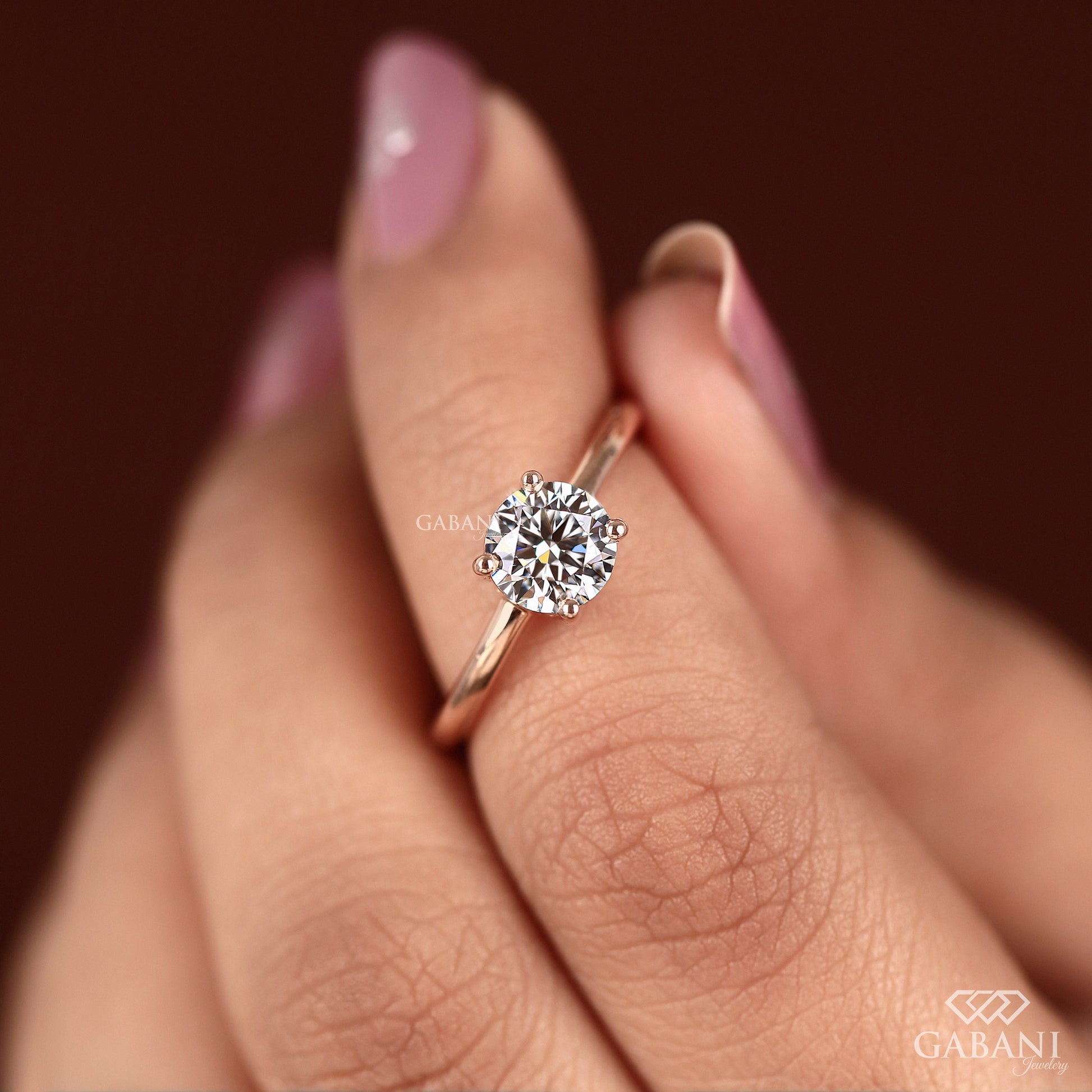 14k rose gold ring with round lab grown diamond and secure prong setting