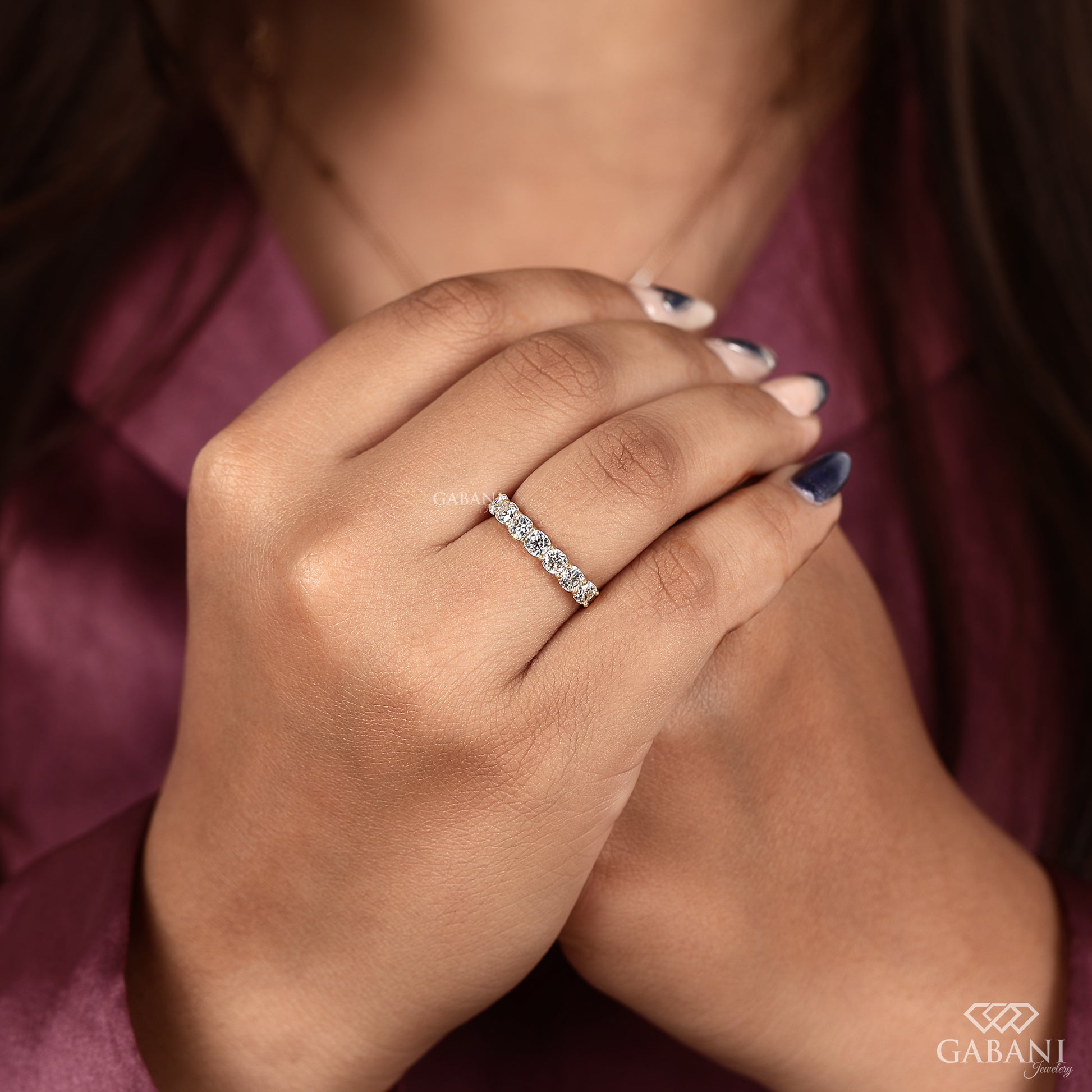 seven stone cushion cut lab created diamond band with a smooth comfort fit yellow gold band